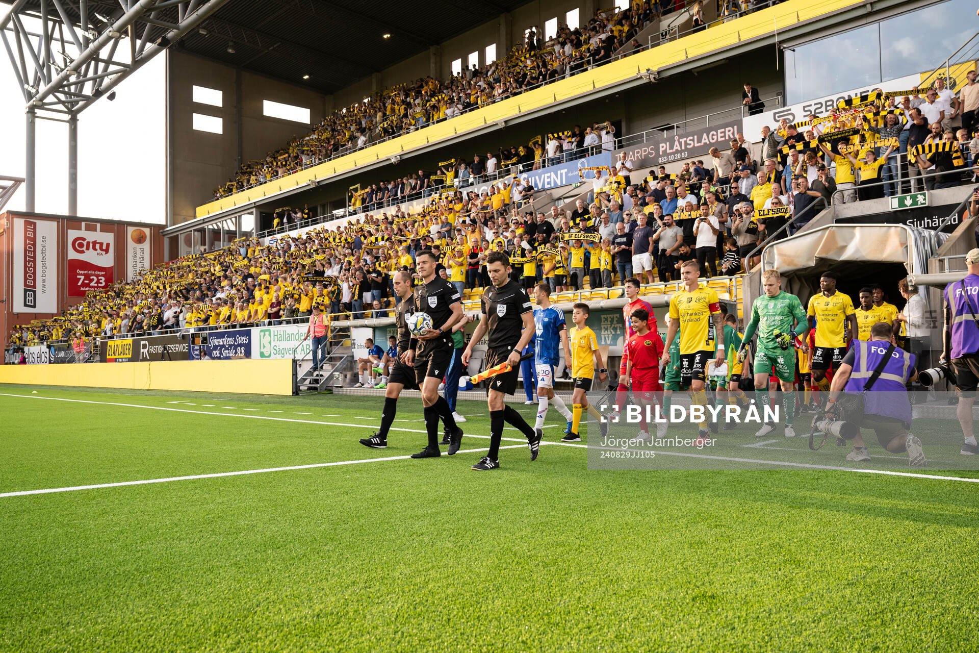 The teams enters the arena
