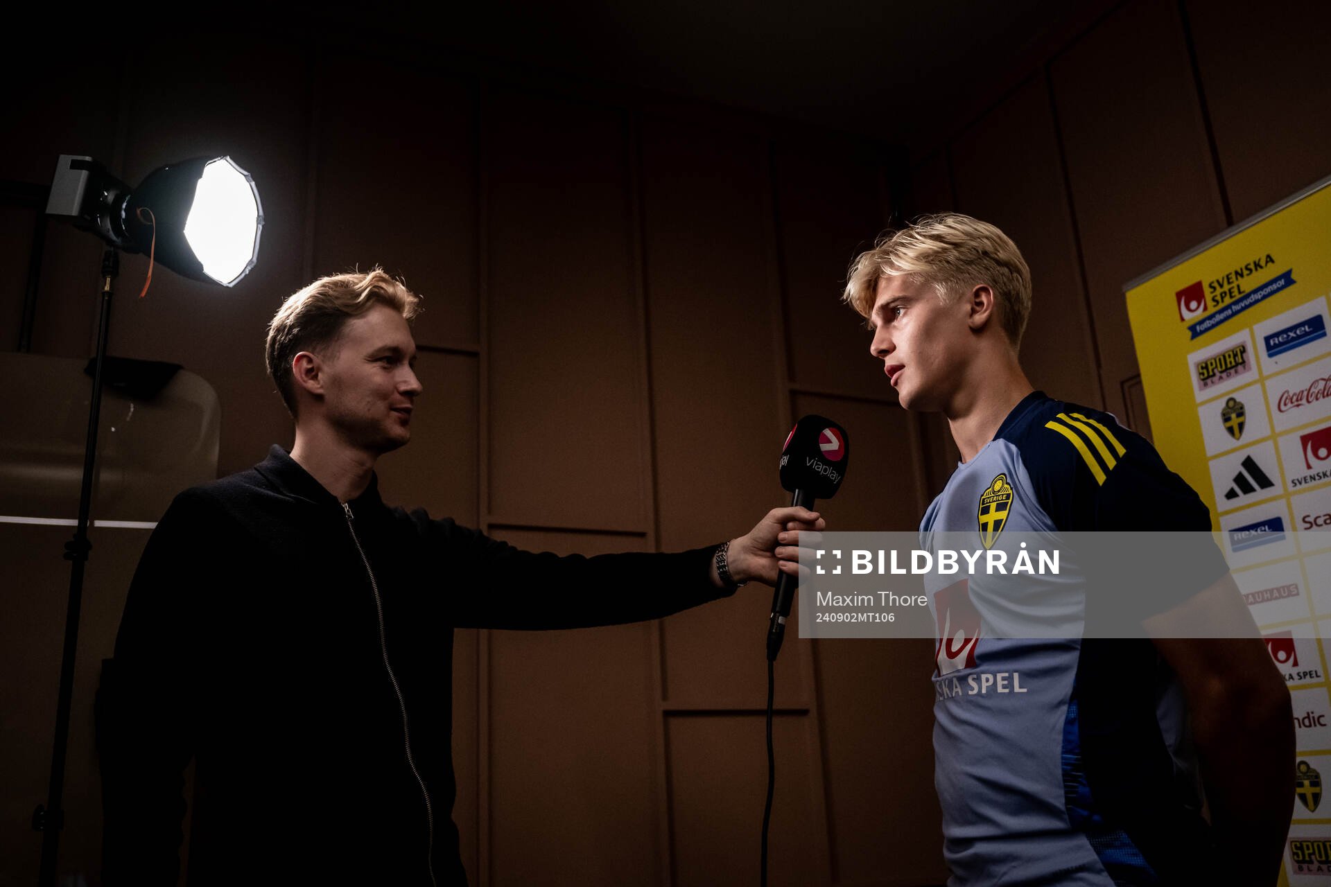 Lucas Bergvall of the Swedish national football team is interviewed by Ludvig Svan from Swedish broadcaster Viaplay in a mixed zone on September 2, 2024 in Stockholm.