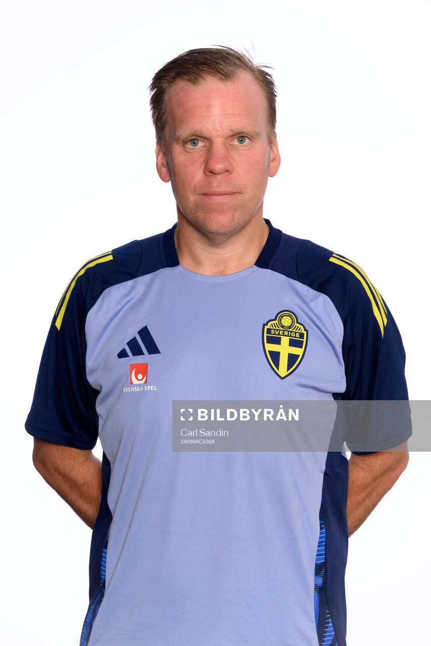 Assistant coach Viktor Eriksson poses for at portrait