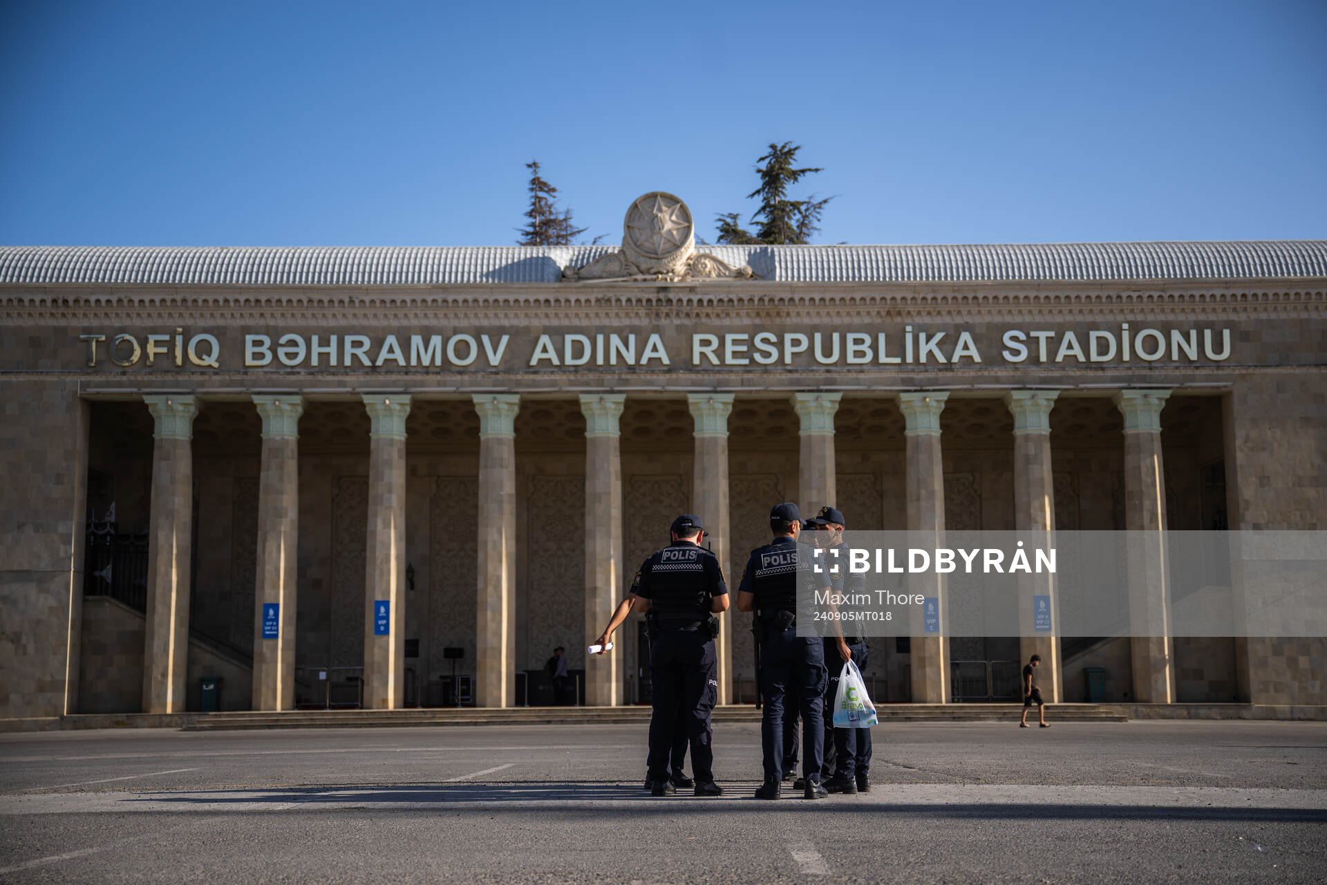 Police gather outside of Tofiq Bahramov