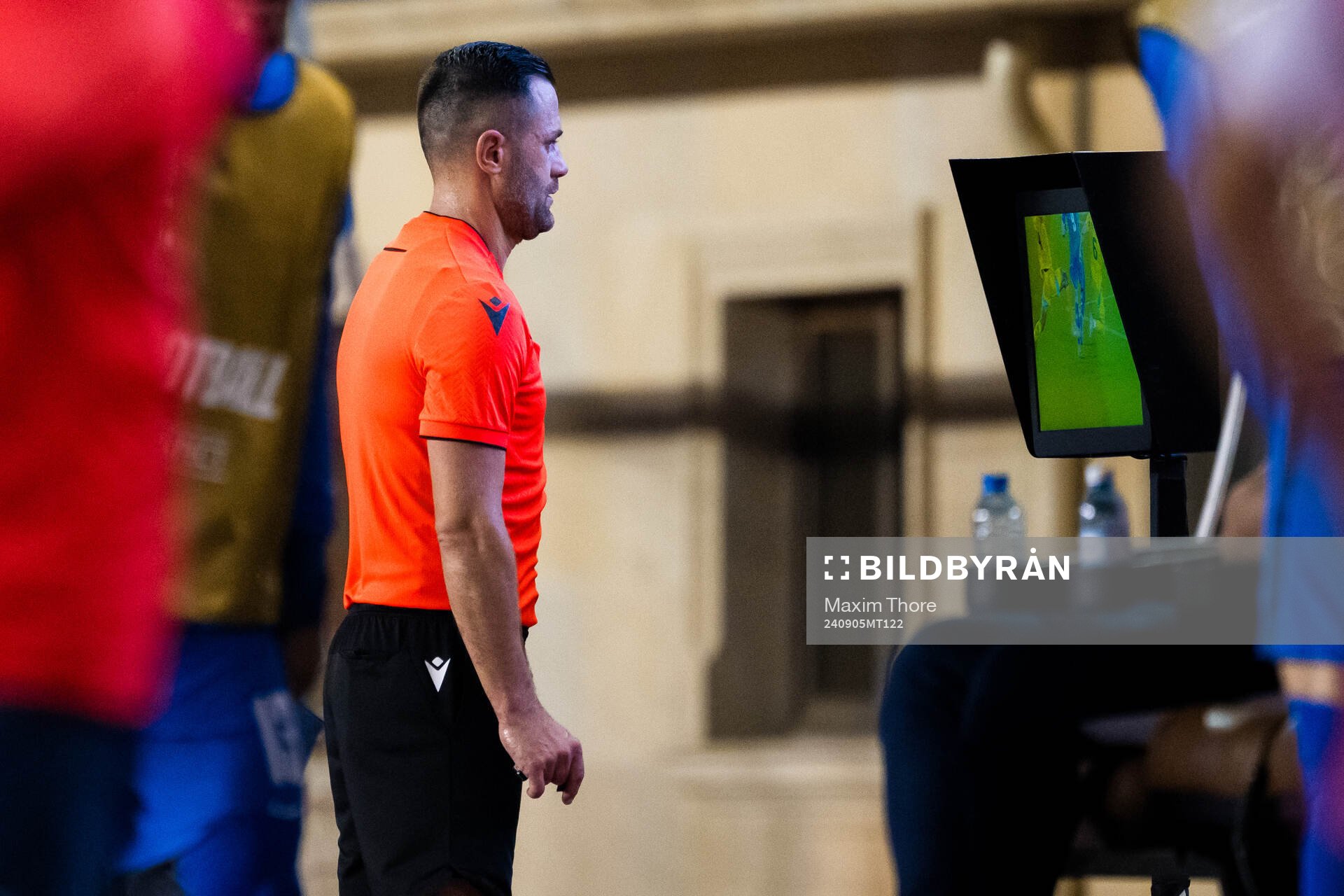 Referee Balazs Berke with a VAR review