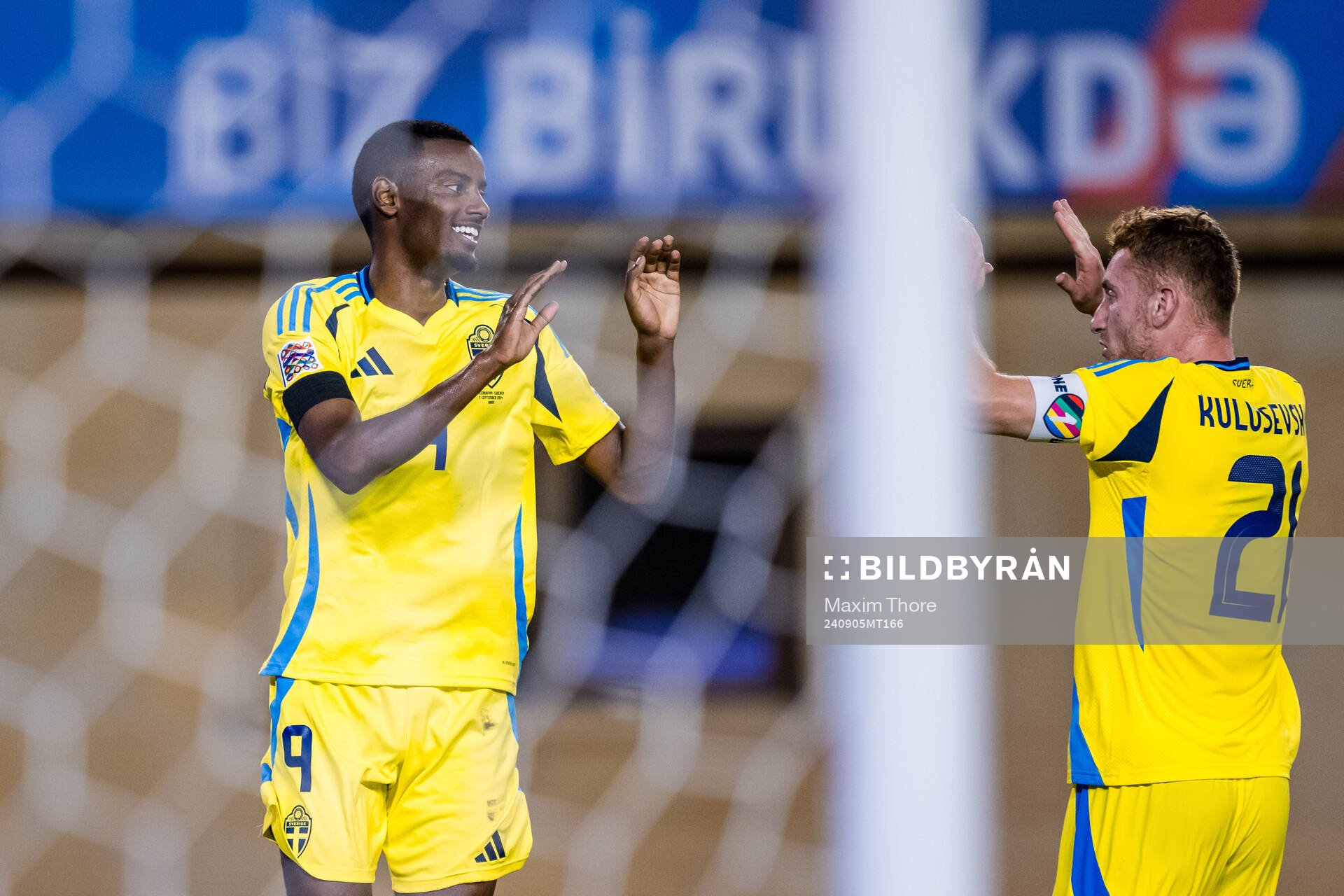 Alexander Isak and Dejan Kulusevski of Sweden celebrate the