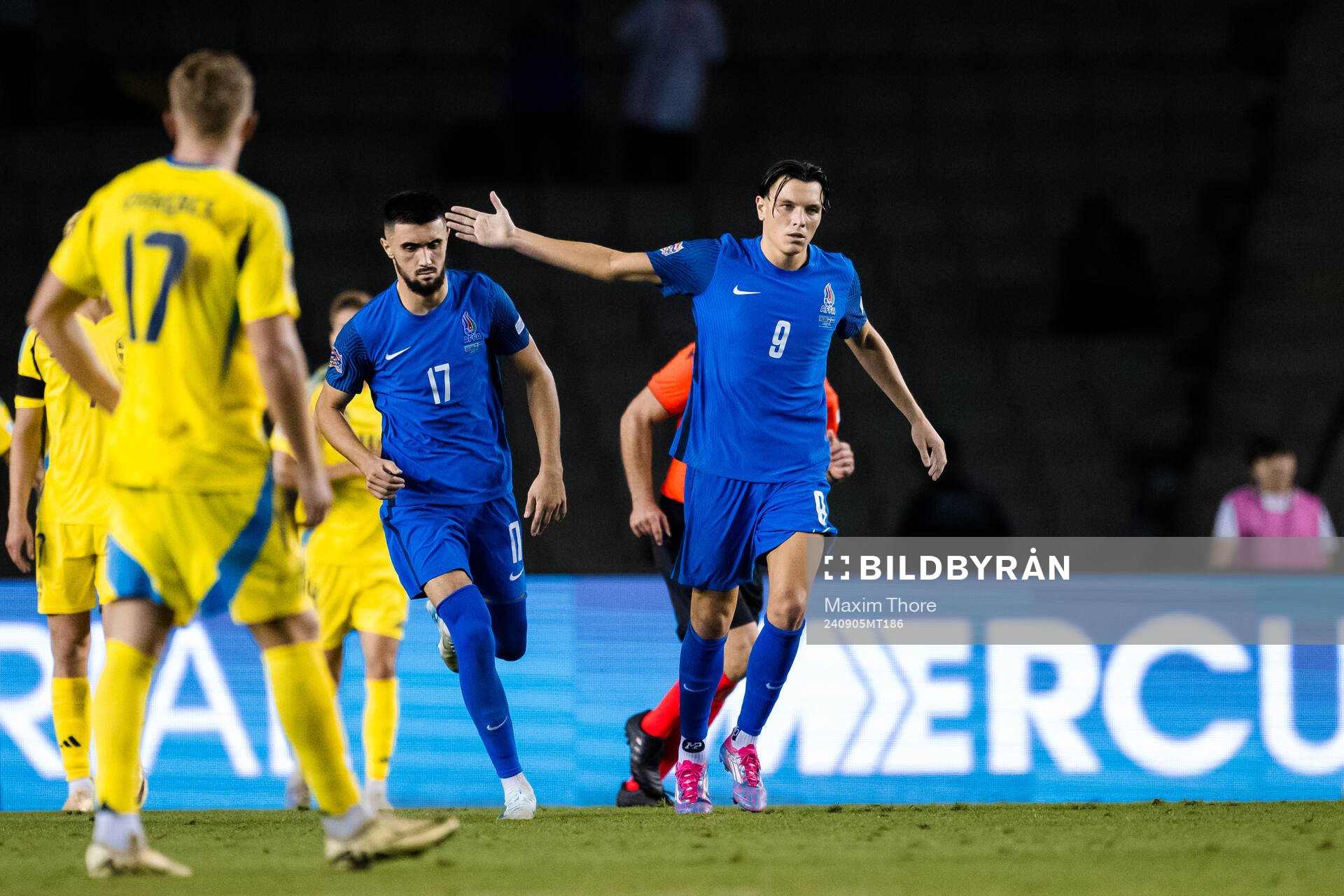 Ramil Sheydaev and Joshgun Diniyev of Azerbaijan celebrate