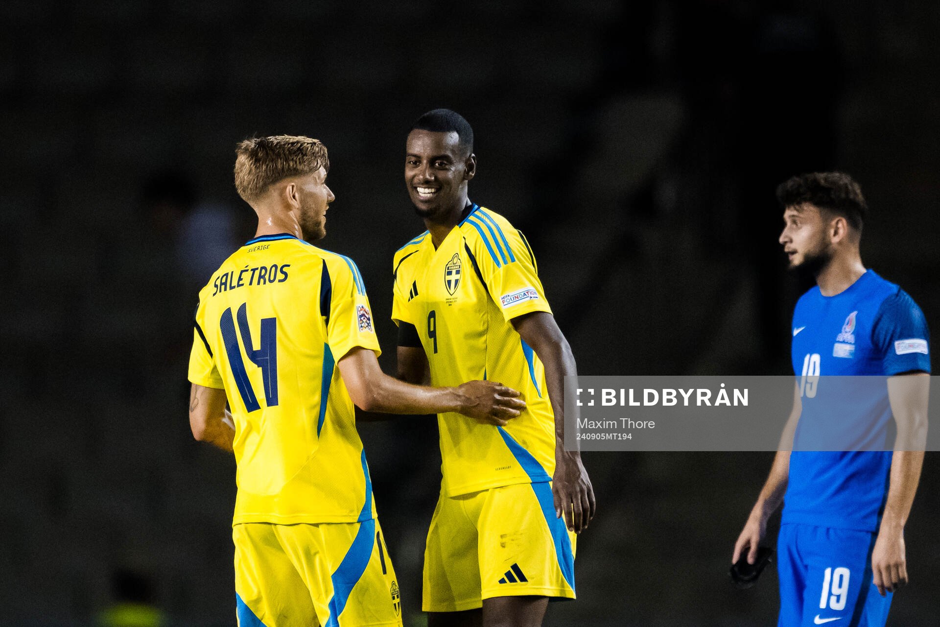 Anton Salétros and Alexander Isak of Sweden celebrate