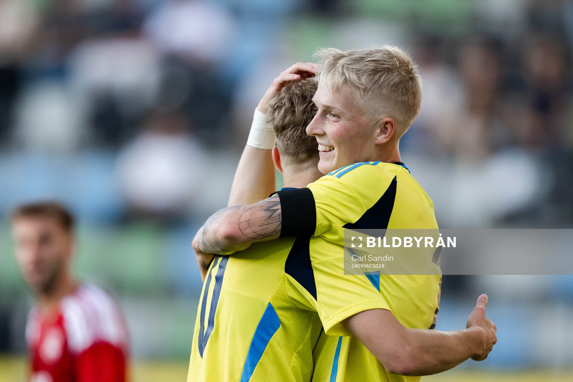 Hugo Bolin and Melker Widell of Sweden celebrate the 4-0