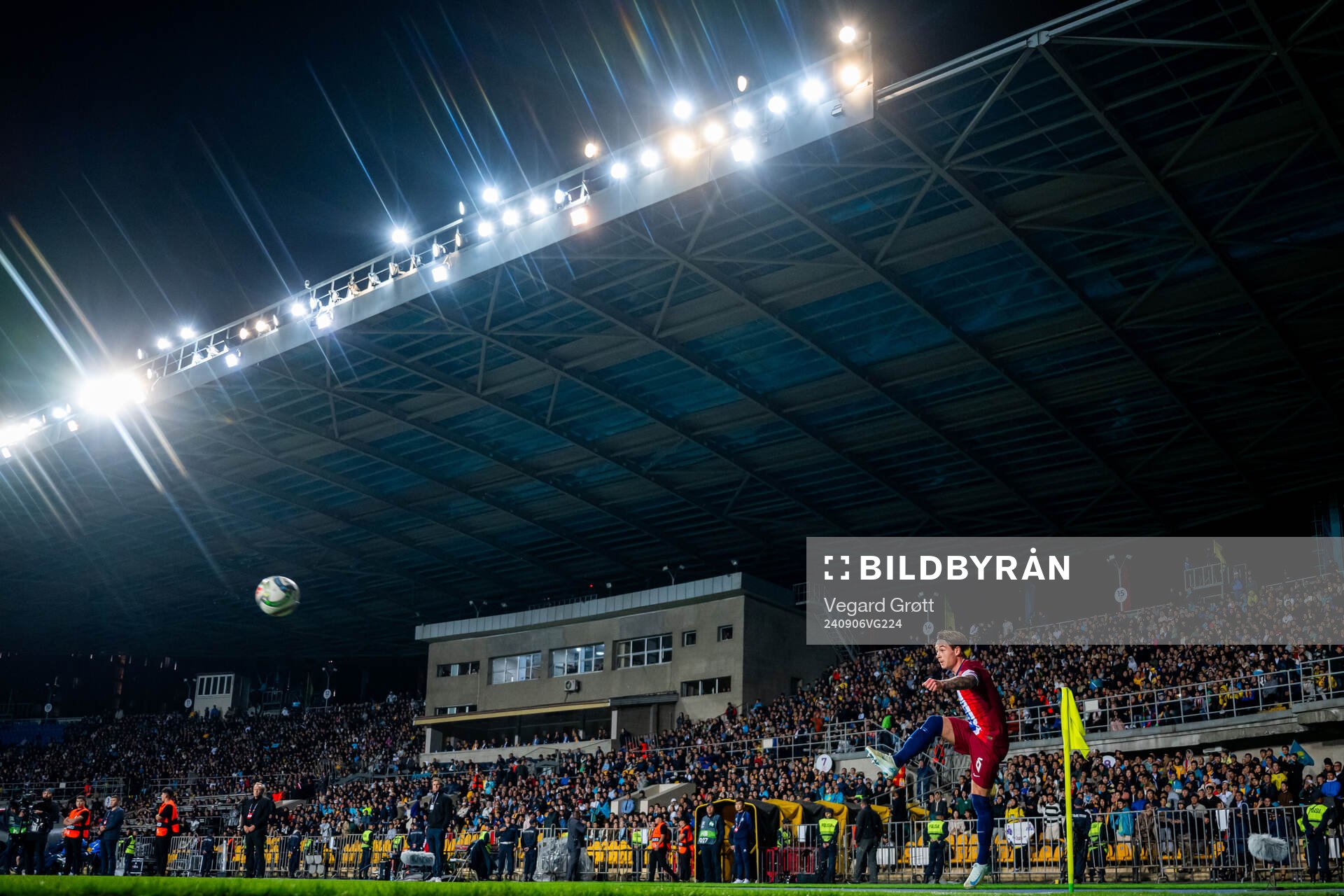 Patrick Berg of Norway takes a corner kick