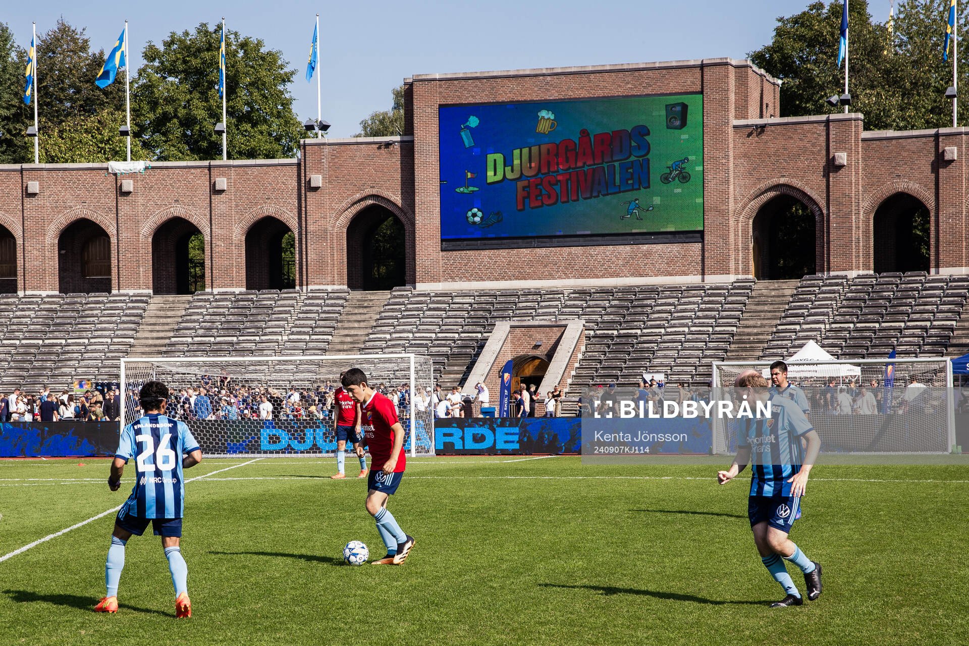 Bildskärm på Stockholms Stadion visar logotyp för