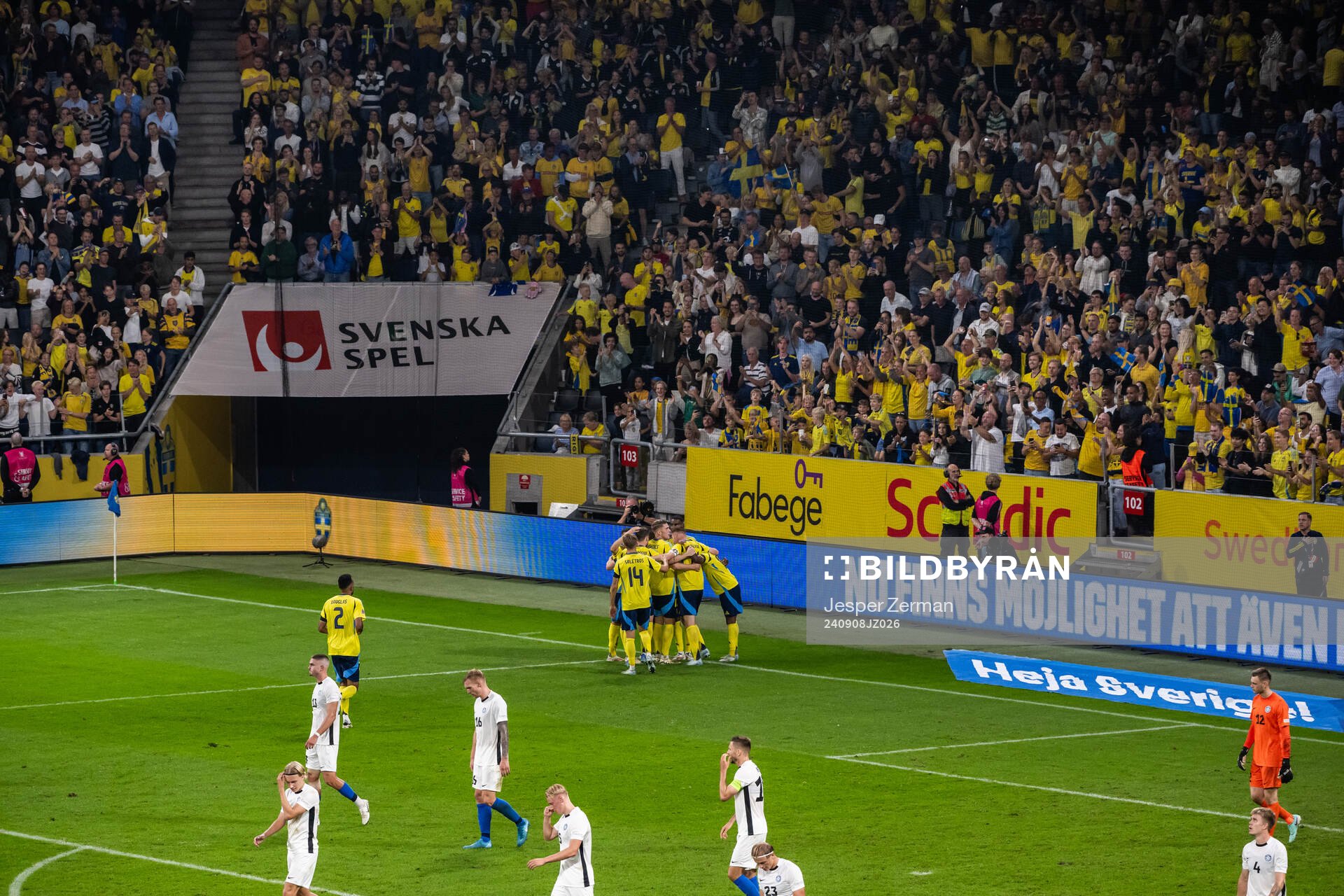 Alexander Isak of Sweden celebrates with team mates