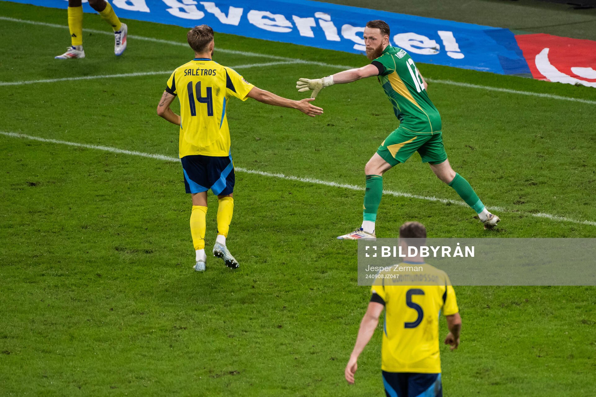 Anton Saletros and goalkeeper Viktor Johansson of Sweden