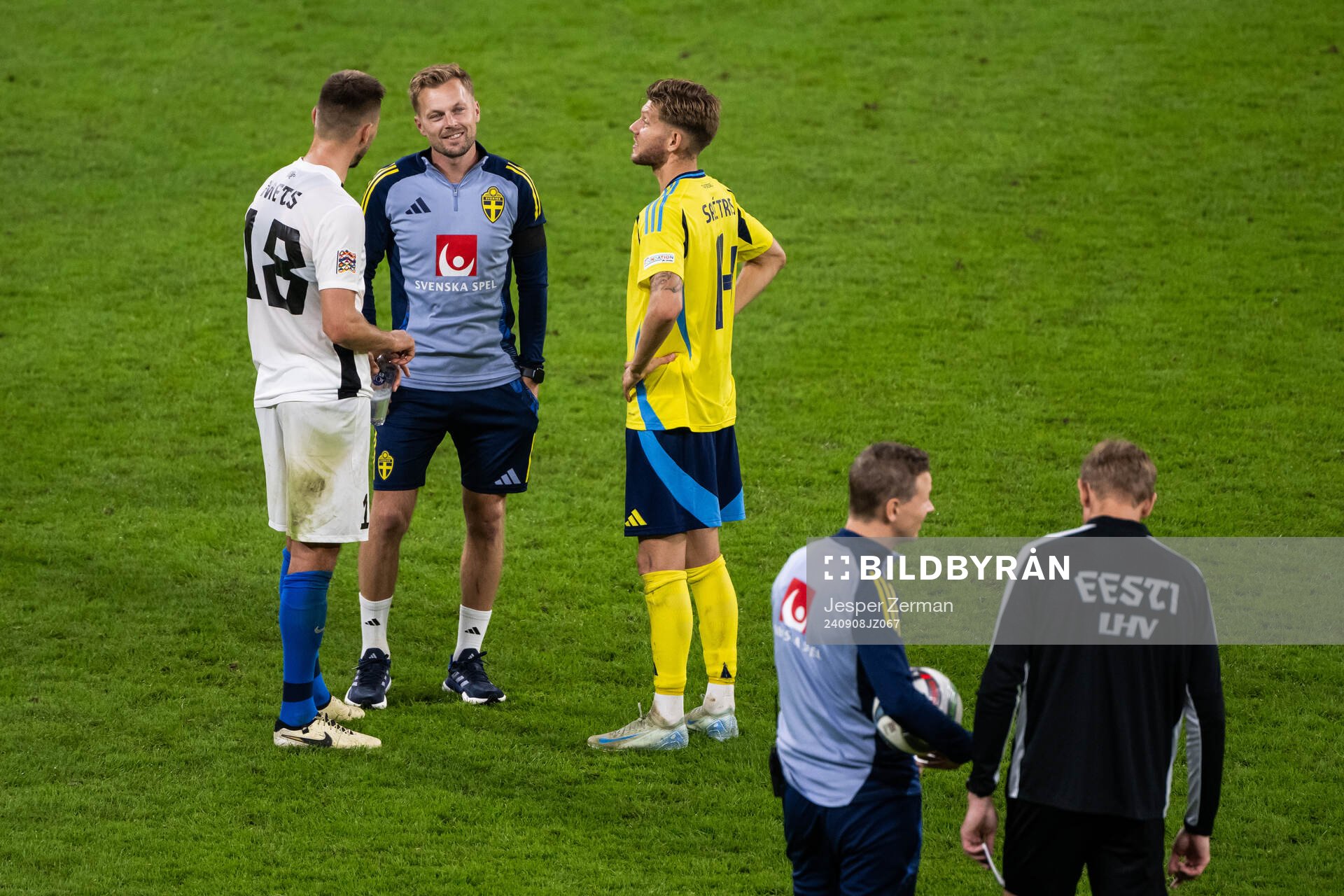 Karol Mets of Estonia, assistant coach Sebastian Larsson