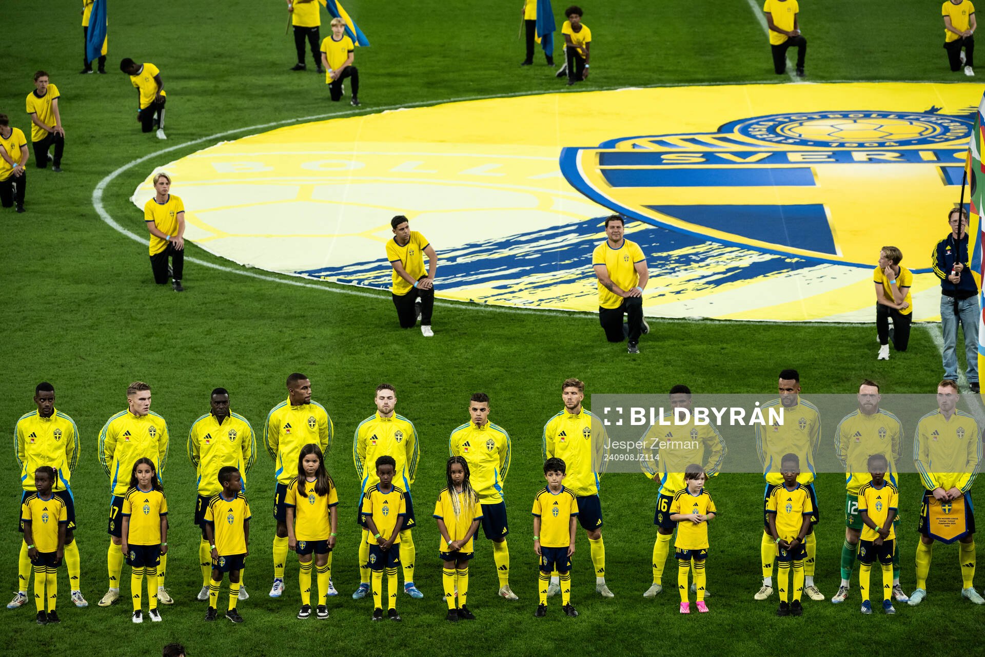 Players of Sweden with mascots during line up ahead of the Nations League football match between Sweden and Estonia on September 8, 2024 in Stockholm.