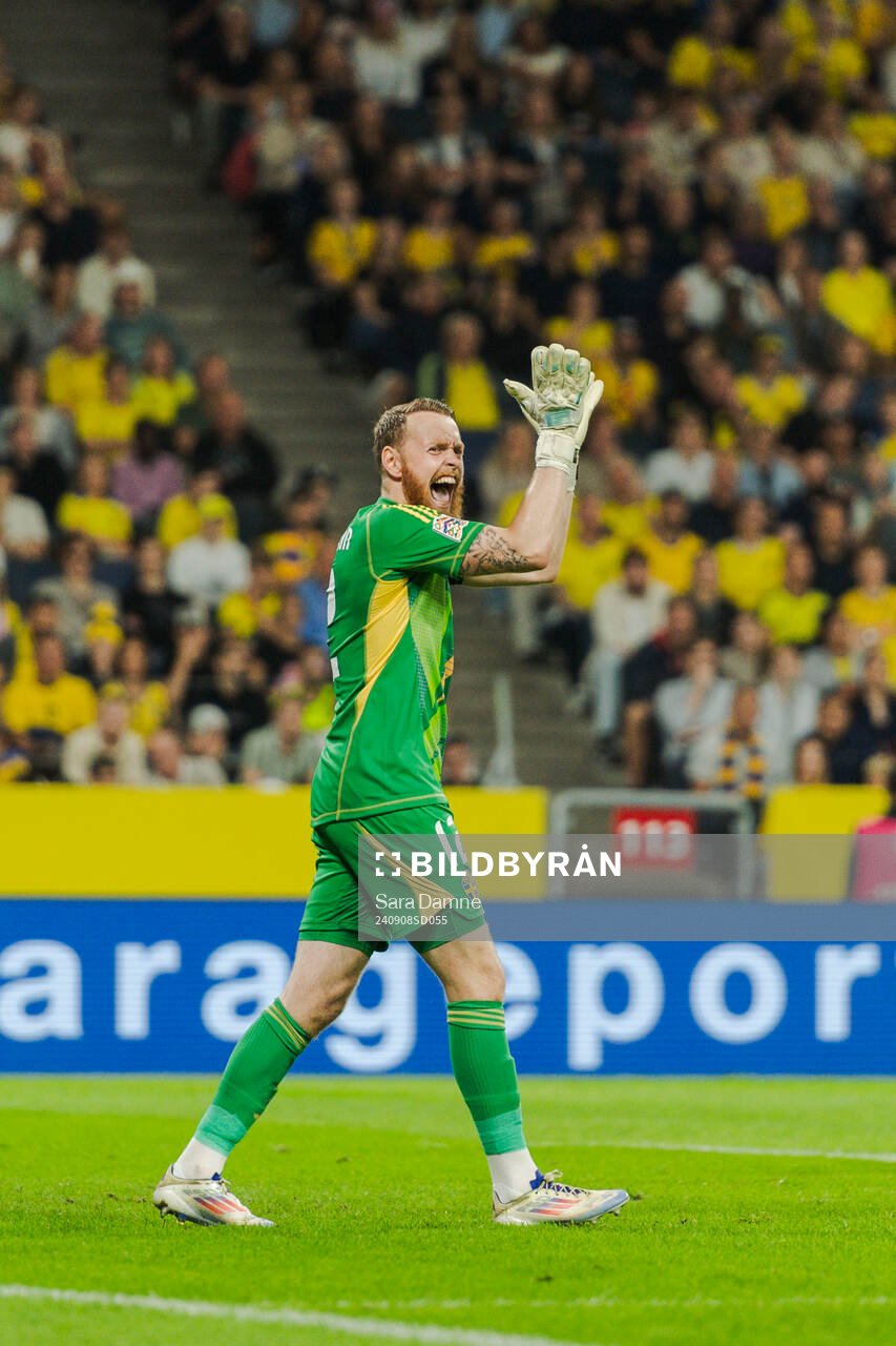 Goalkeeper Viktor Johansson of Sweden celebrates