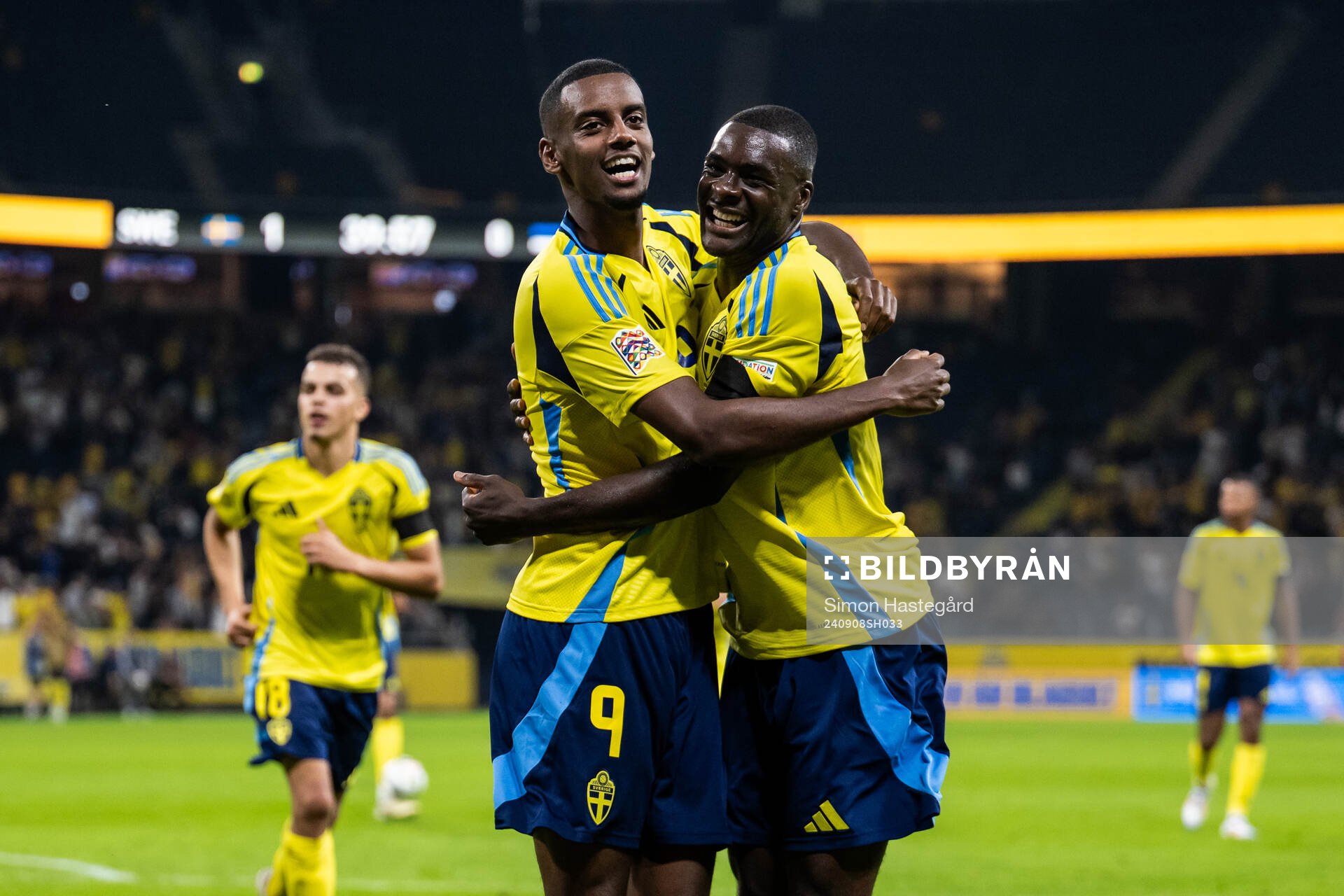 Alexander Isak scored 2-0 and celebrates with Ken Sema of
