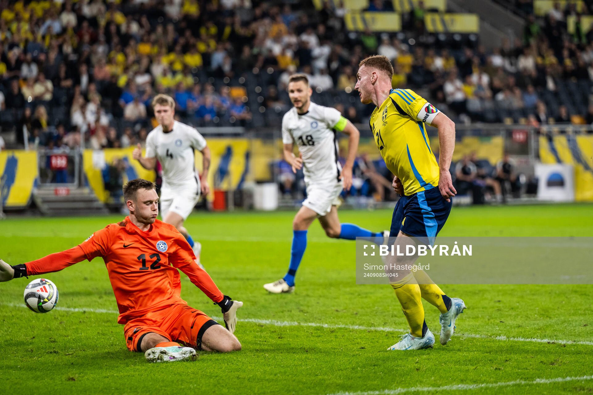 Dejan Kulusevski of Sweden with a pass past goalkeeper Karl