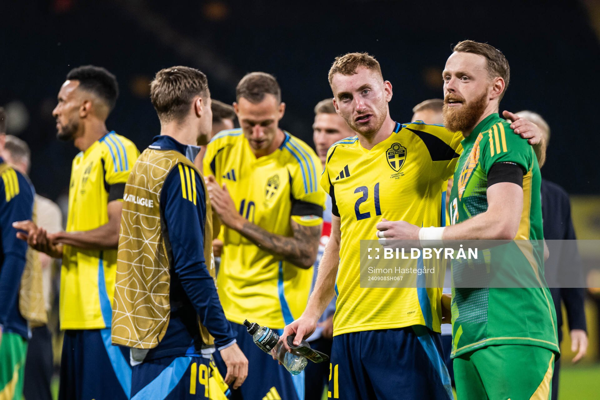 Dejan Kulusevski and goalkeeper Viktor Johansson of Sweden