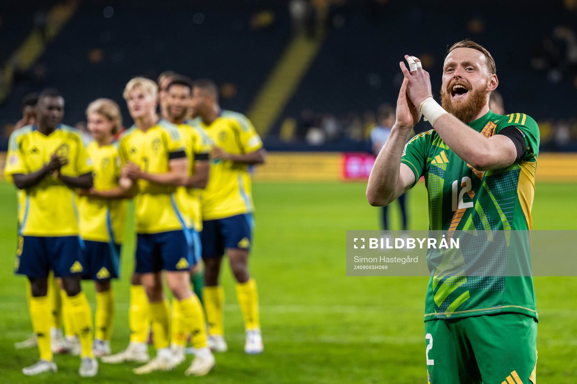 Goalkeeper Viktor Johansson of Sweden celebrates