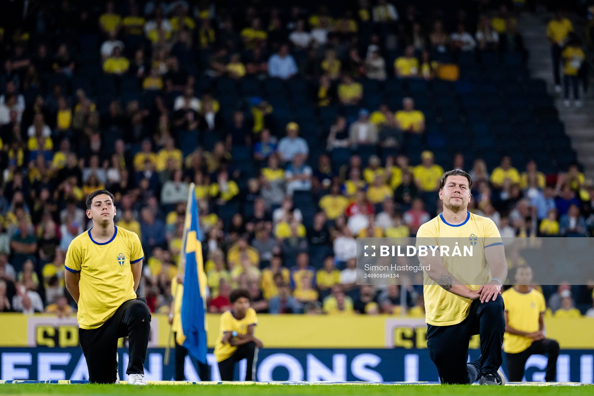 Flag-bearers ahead of the Nations League football match between Sweden and Estonia on September 8, 2024 in Stockholm. 