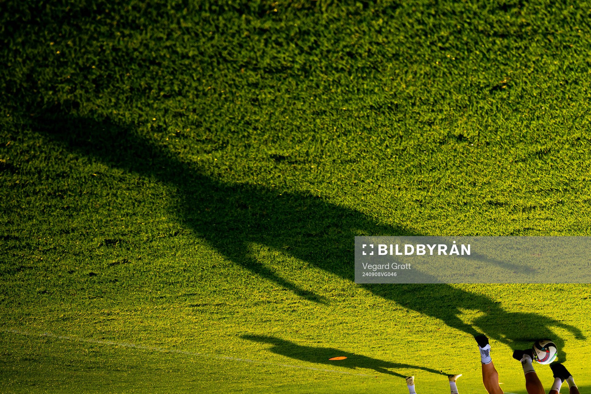 The shadow of a player of the Norwegian national football