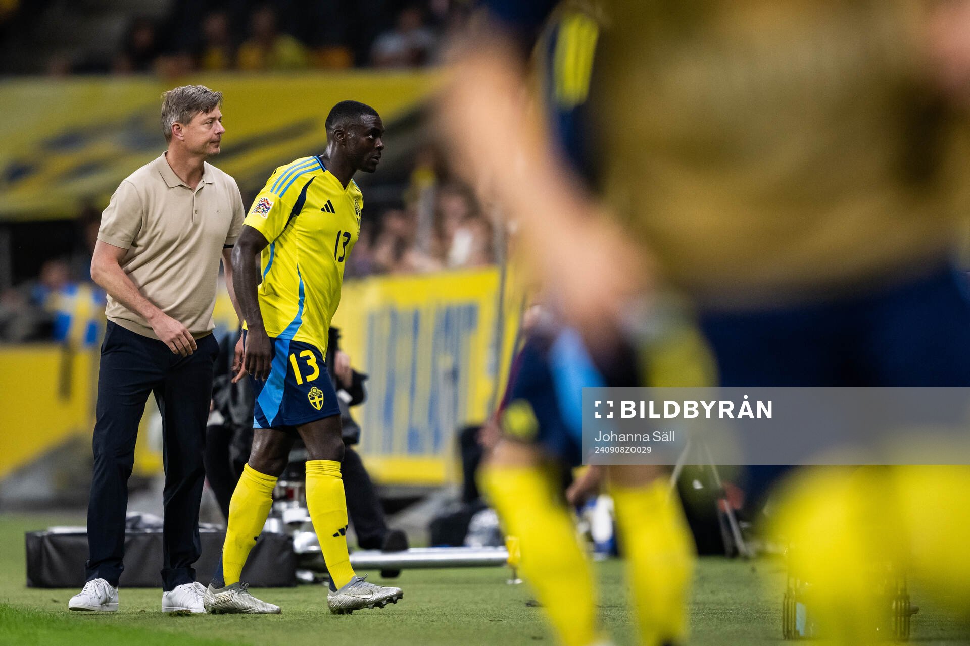 Head coach Jon Dahl Tomasson and Ken Sema of Sweden