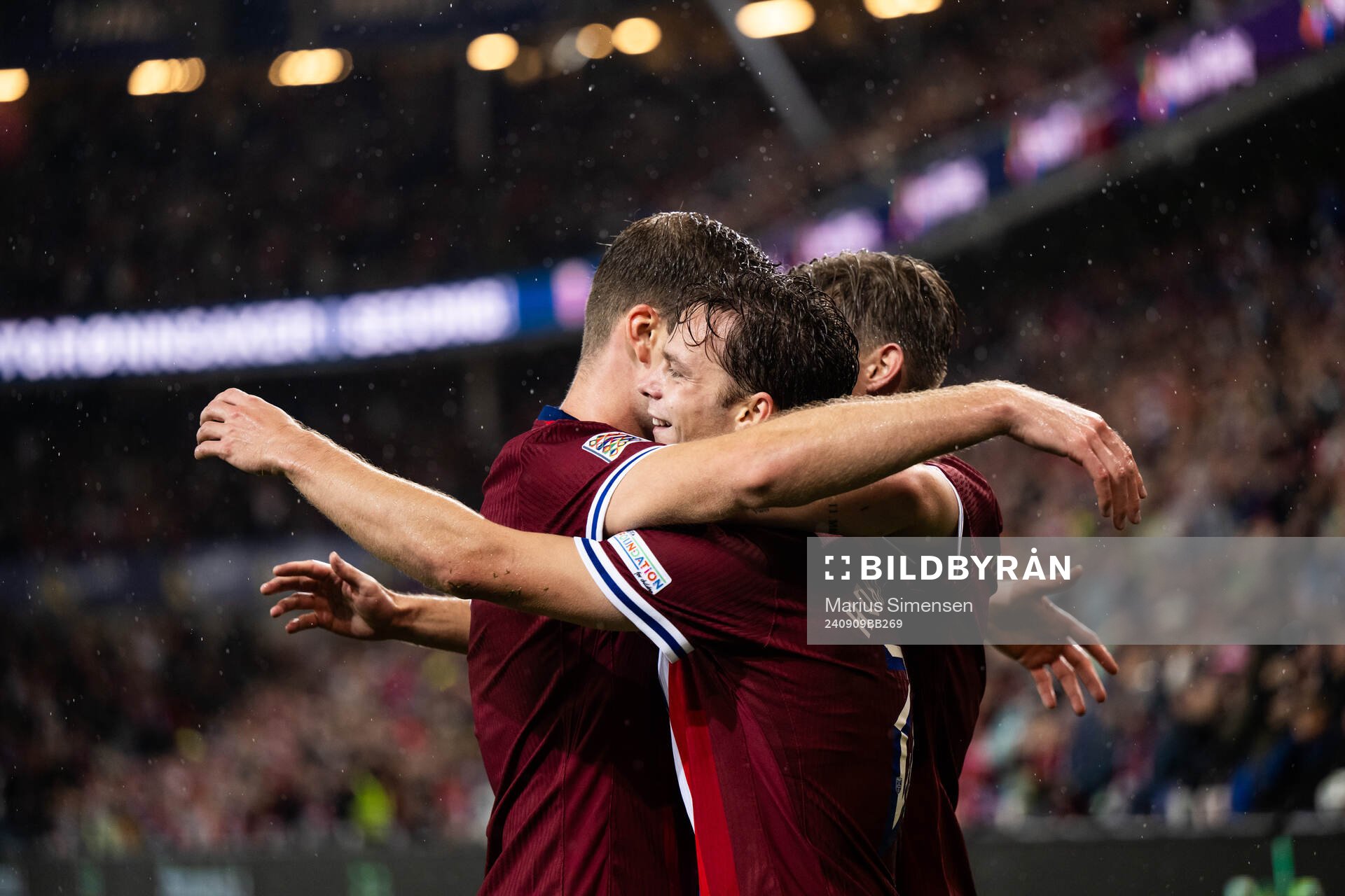 Felix Horn Myhre of Norway celebrates with team mates