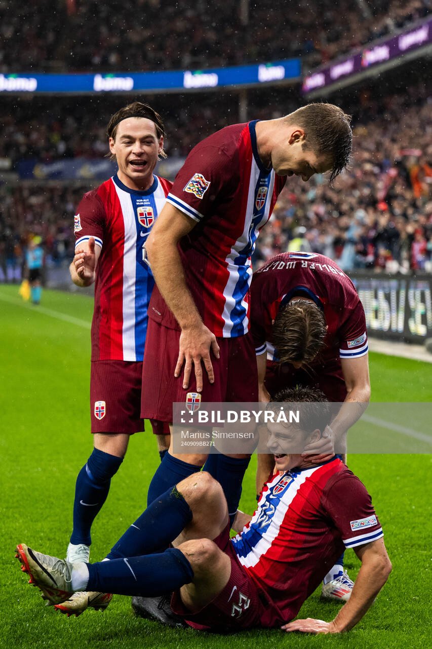 Felix Horn Myhre of Norway celebrates with team mates