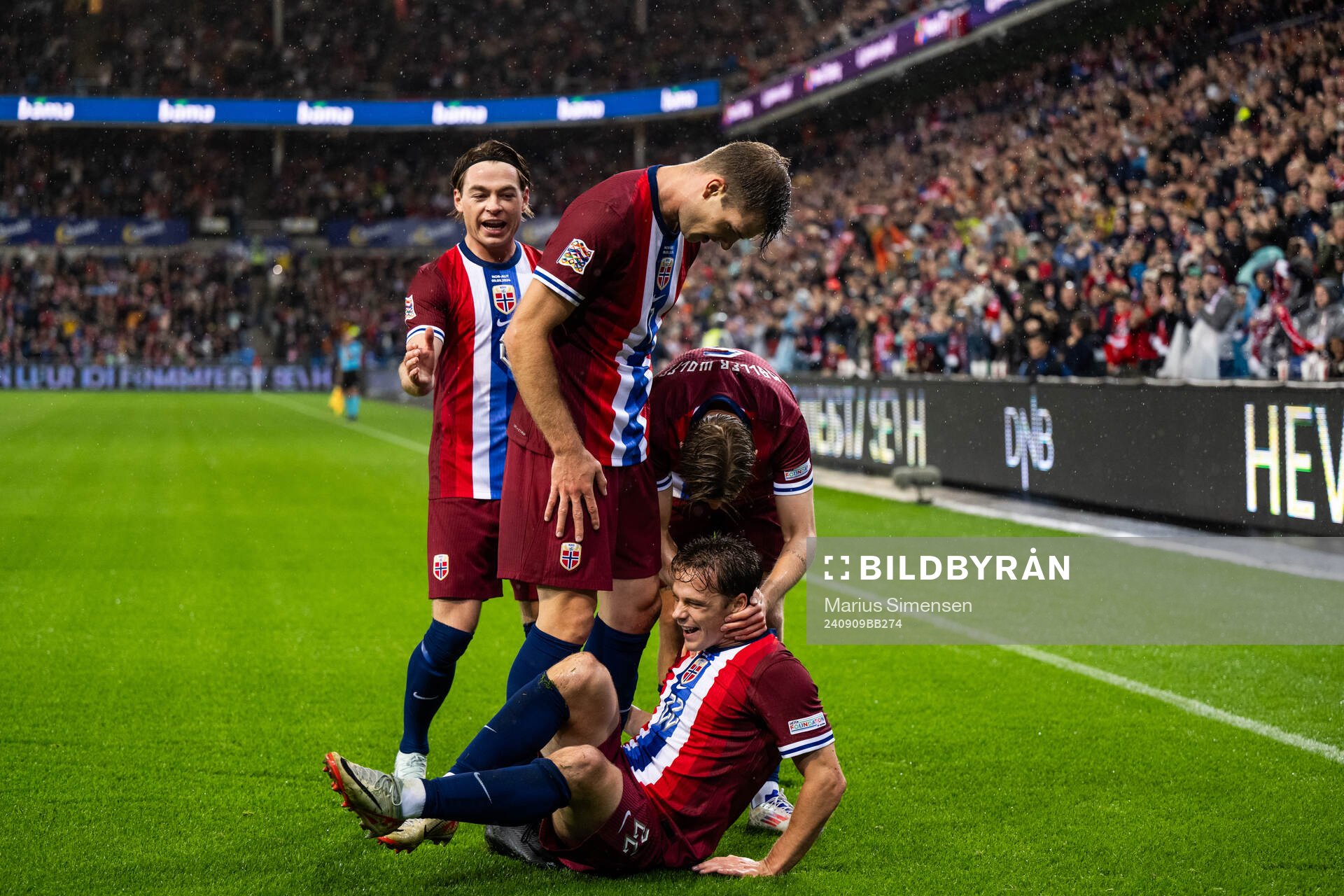 Felix Horn Myhre of Norway celebrates with team mates