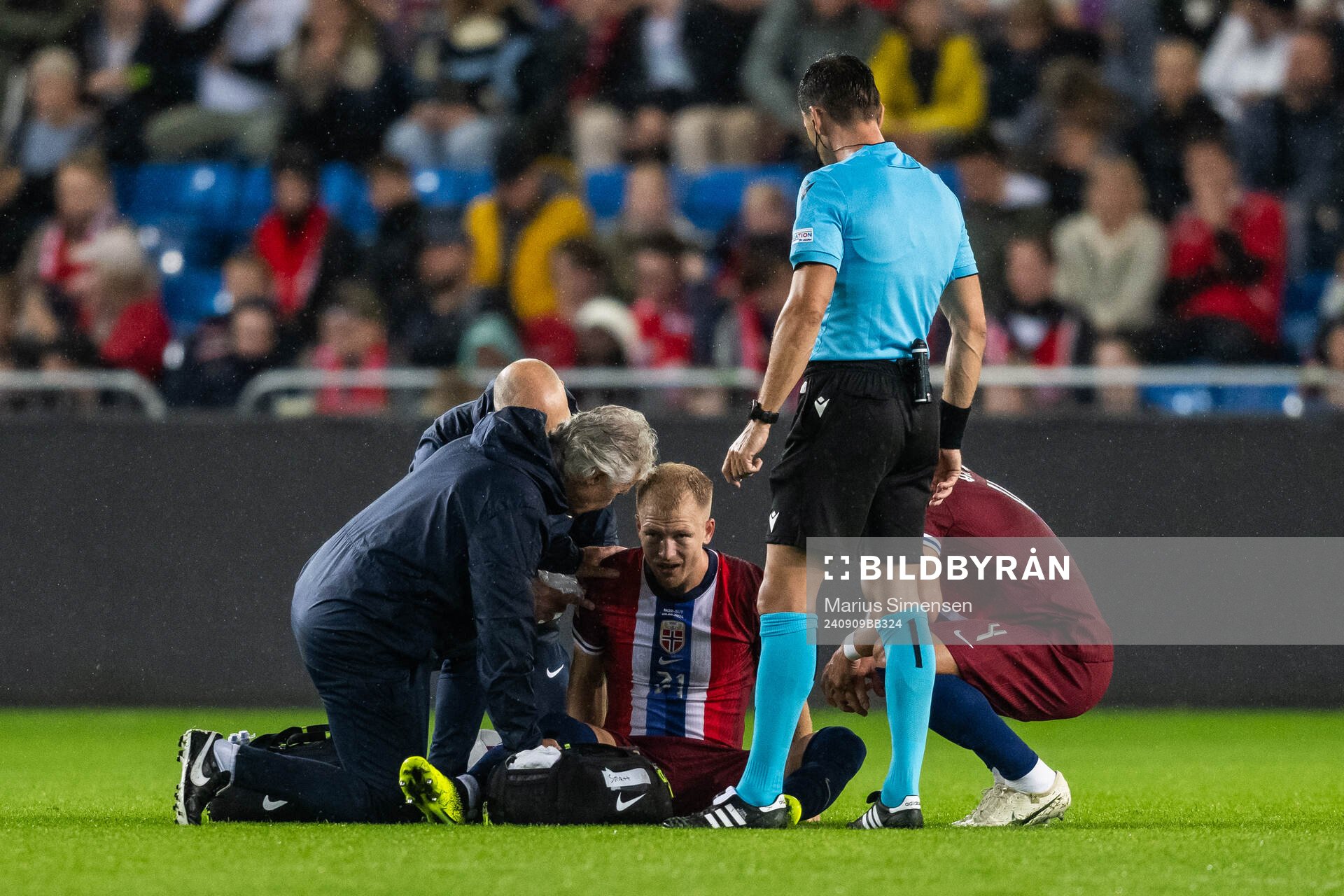 Andreas Hanche-Olsen of Norway receives medical attention during the Nations League football match between Norway and Austria on September 9, 2024 in Oslo. 