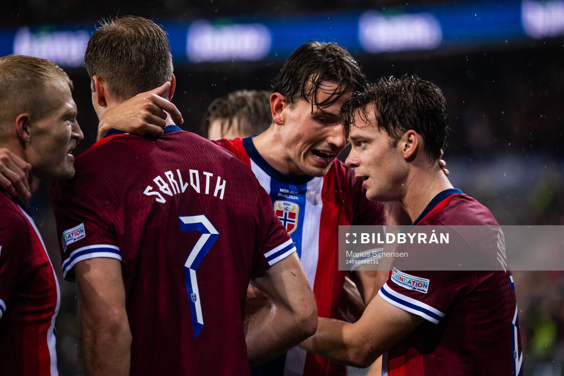 Felix Horn Myhre of Norway celebrates with team mates