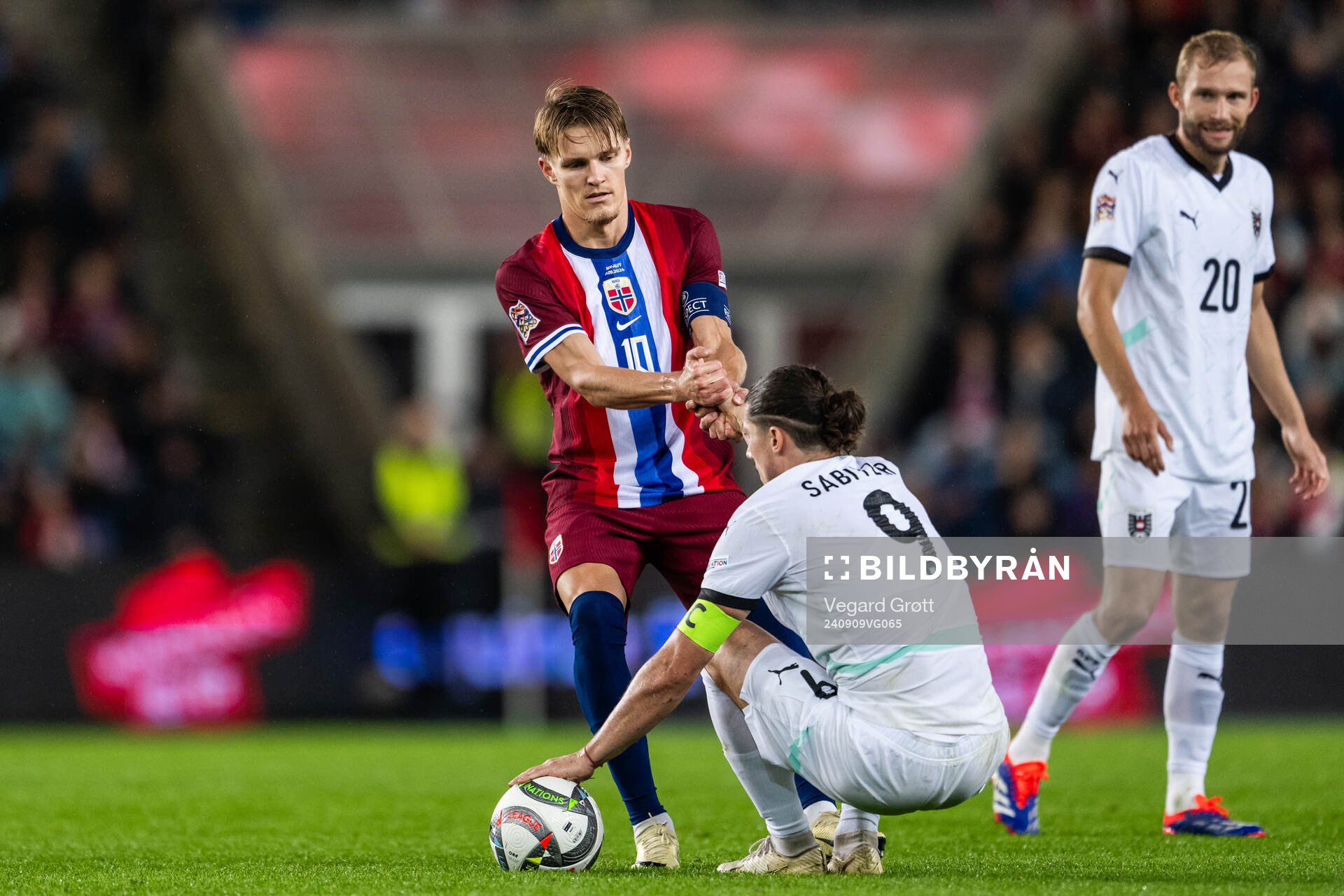 Martin Ødegaard of Norway and Marcel Sabitzer of Austria