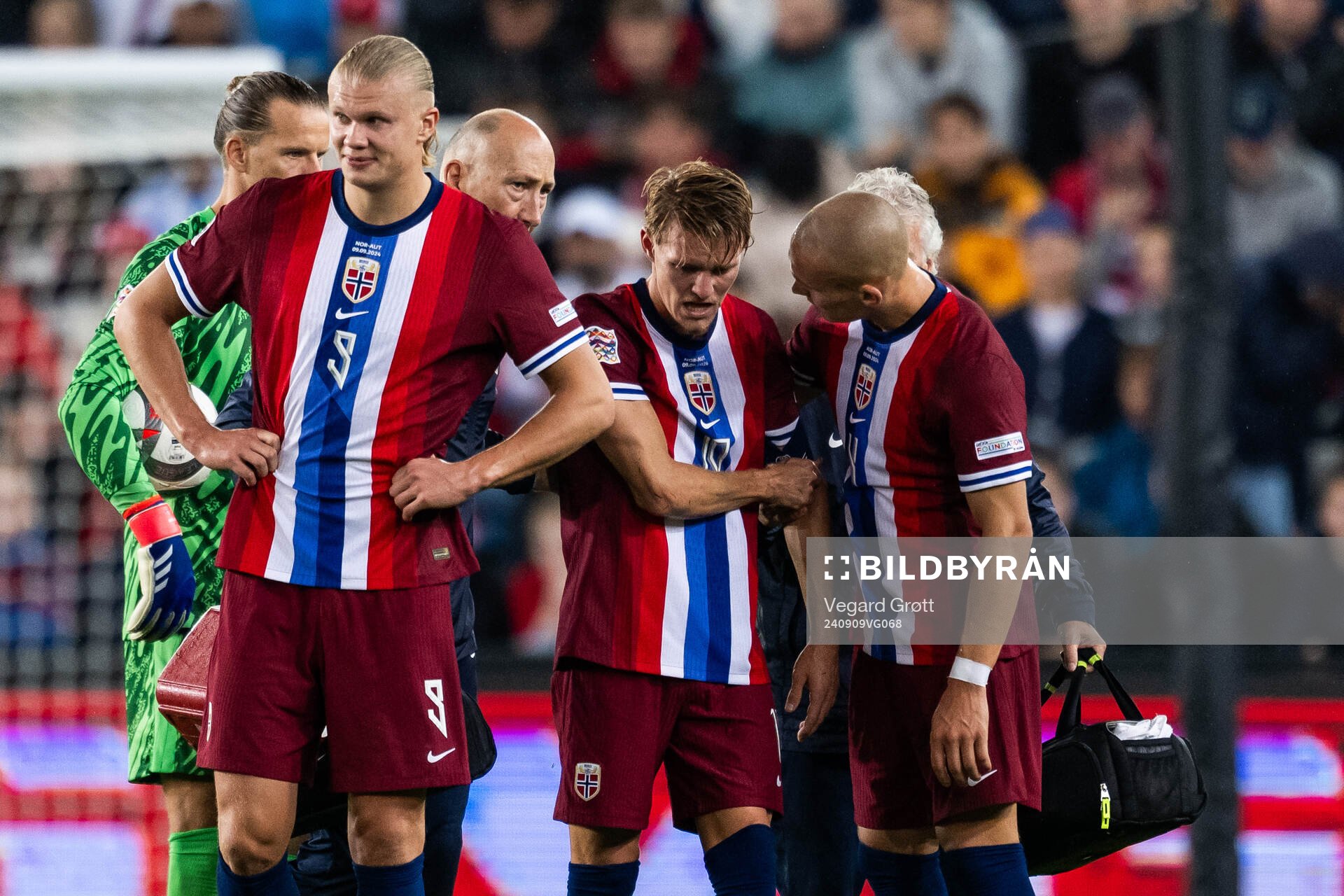 Martin Ødegaard of Norway leaves the pitch due to injury