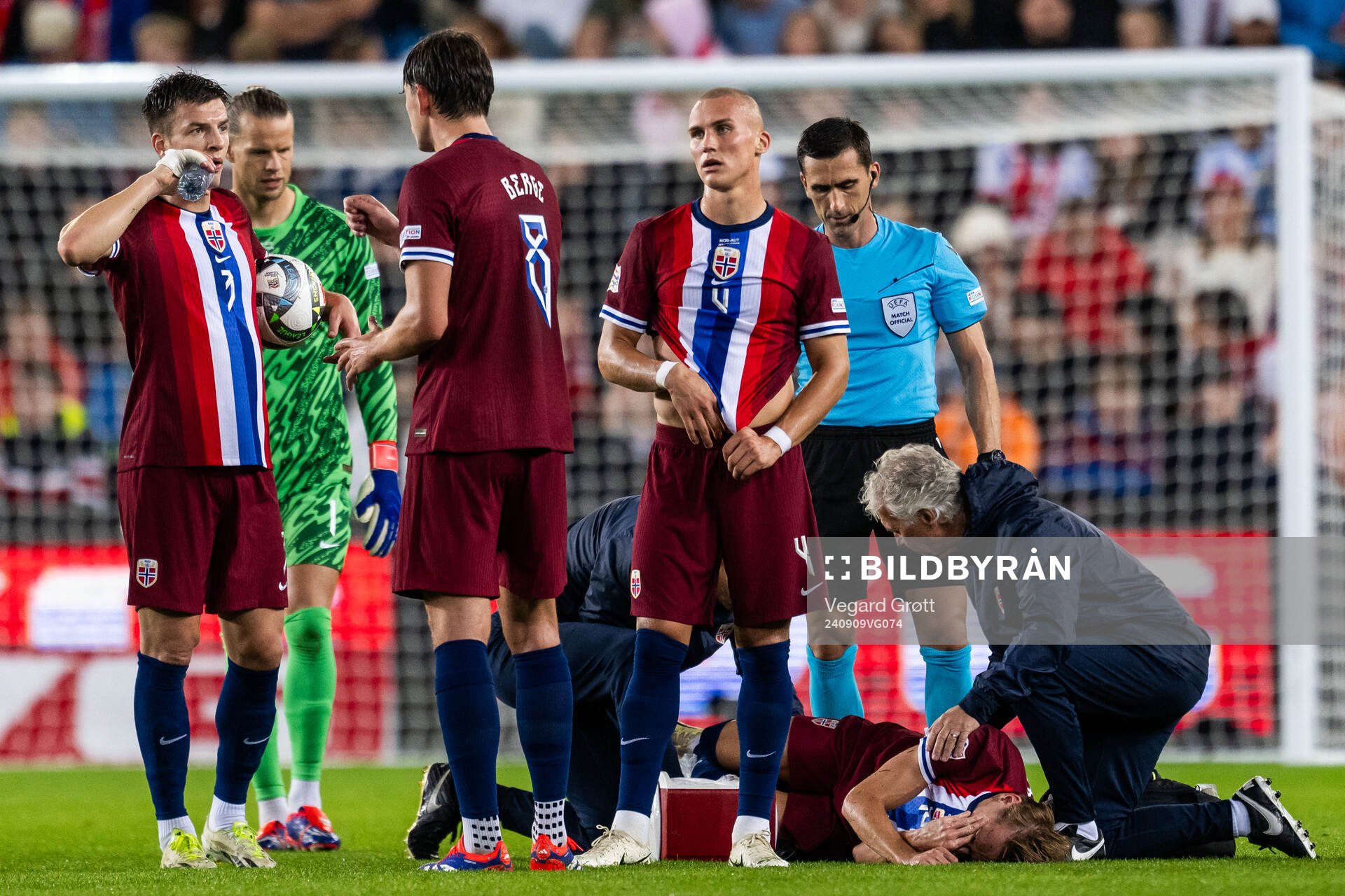 Martin Ødegaard of Norway receives medical attention
