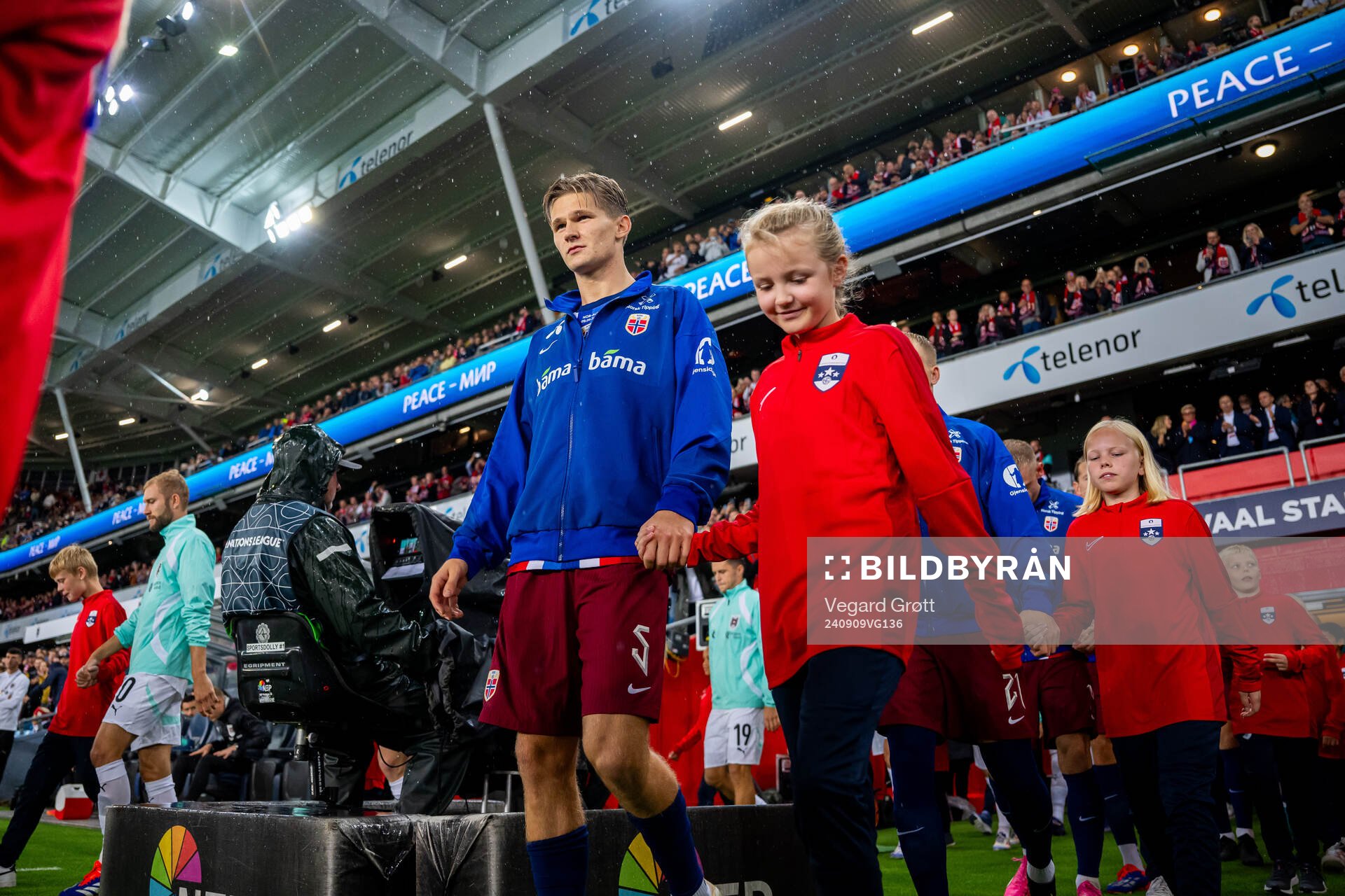 David Møller Wolfe of Norway enters the pitch