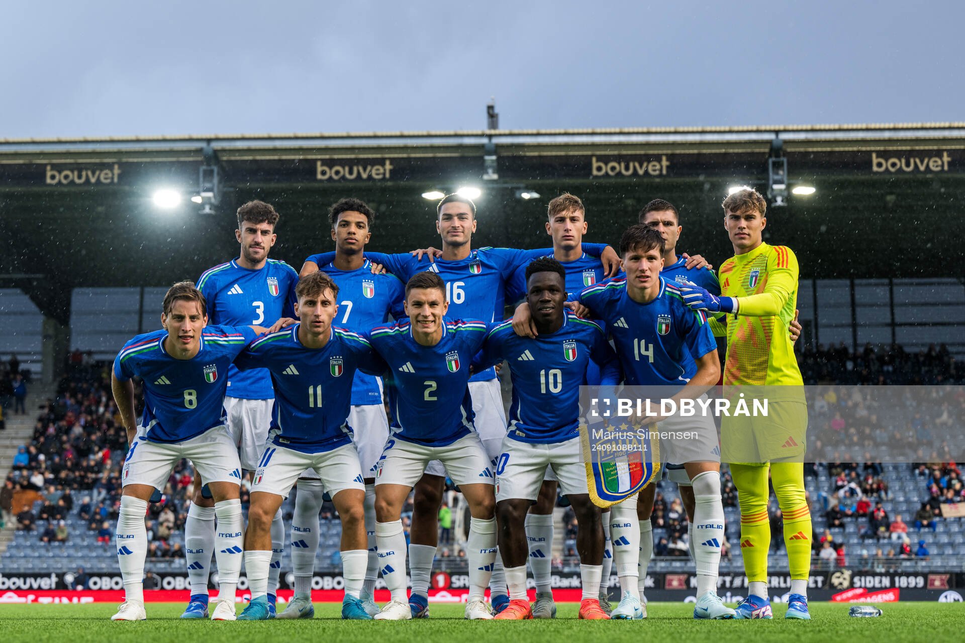 The starting eleven of Italy pose for a team group photo