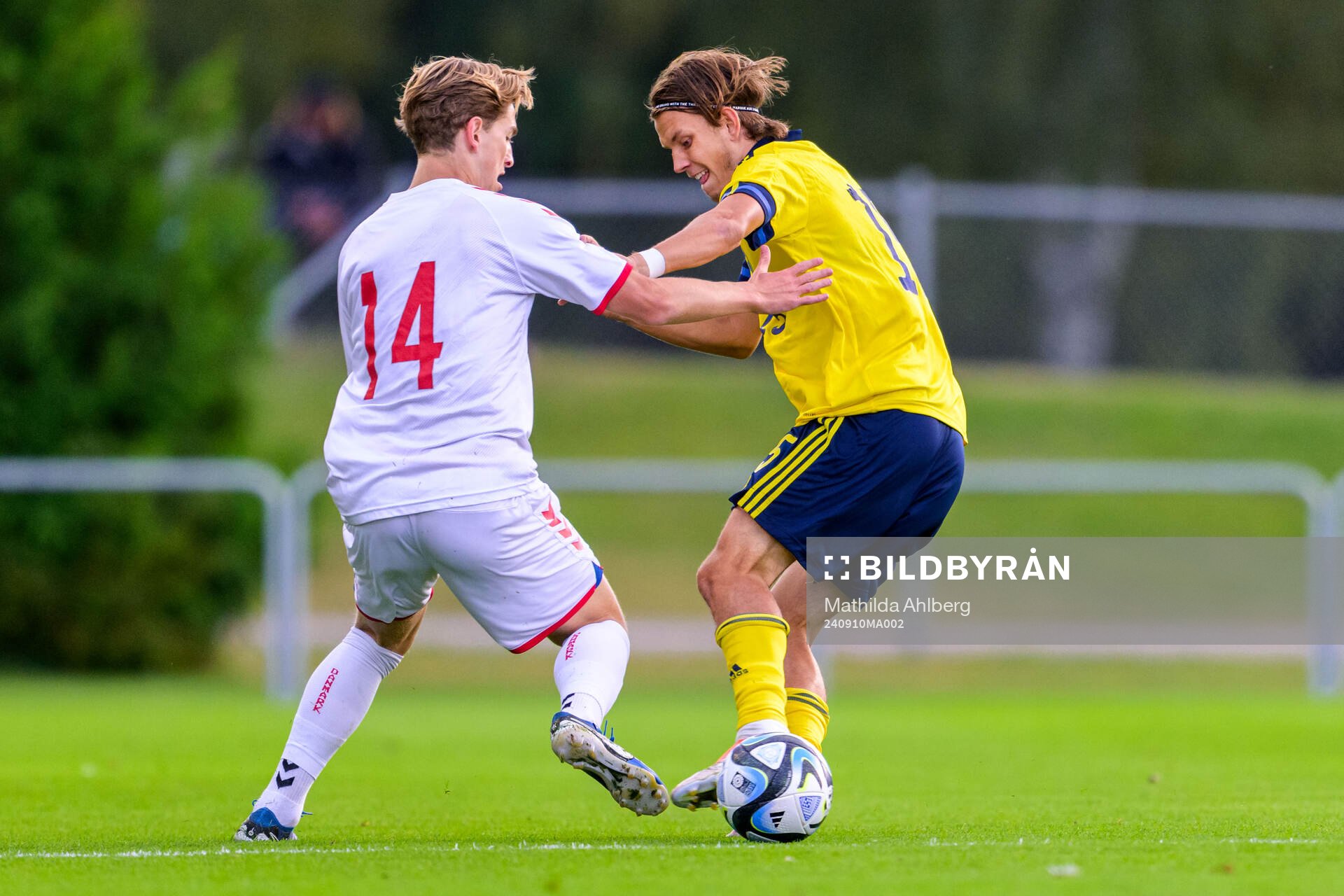 Valdemar Byskov of Denmark and Kazper Karlsson of Sweden during the U20 football match between Sweden and Denmark on September 10, 2024 in Hässleholm. 
