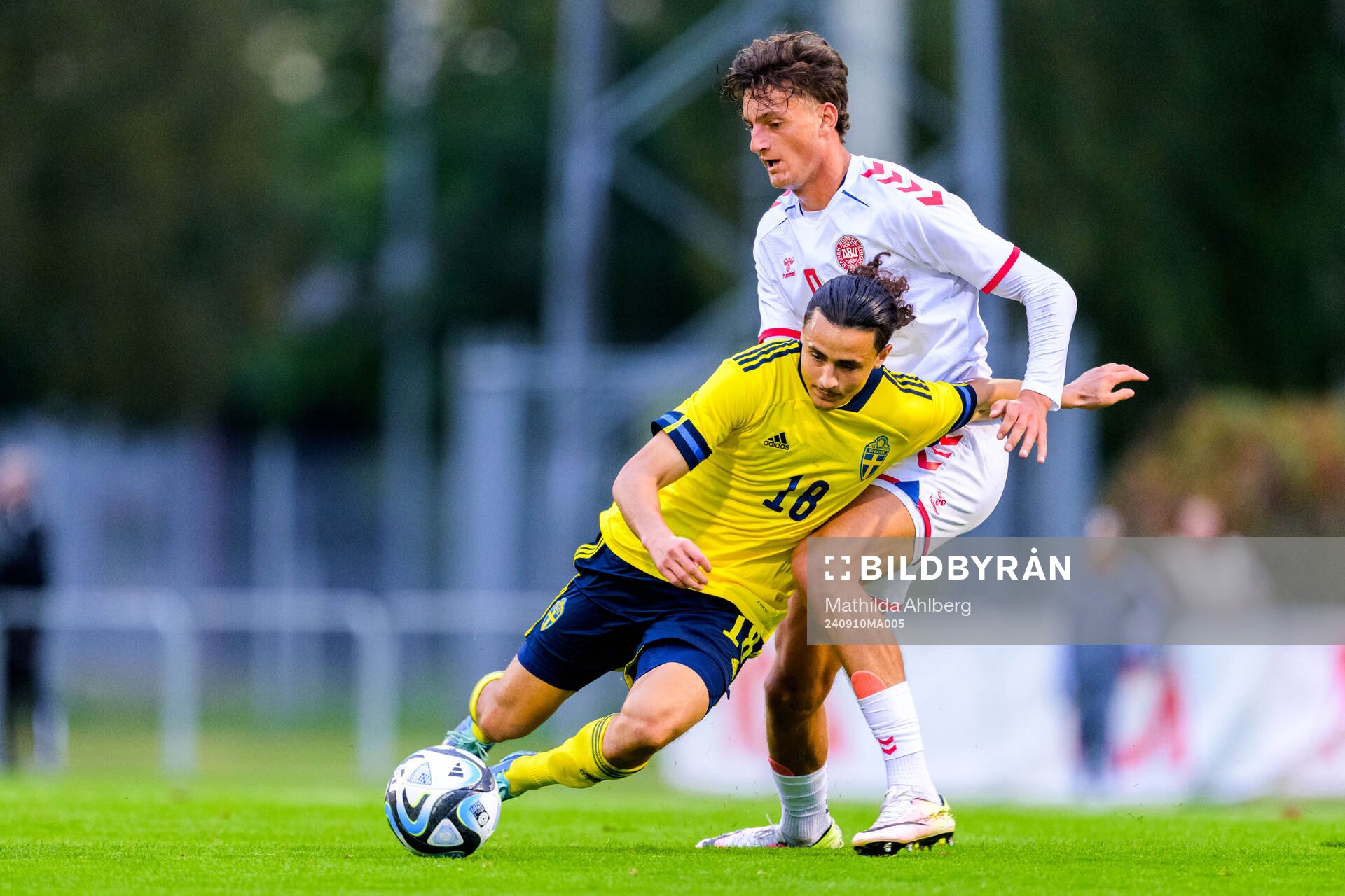 Silas Andersen of Denmark and Amin Boudri of Sweden during the U20 football match between Sweden and Denmark on September 10, 2024 in Hässleholm.