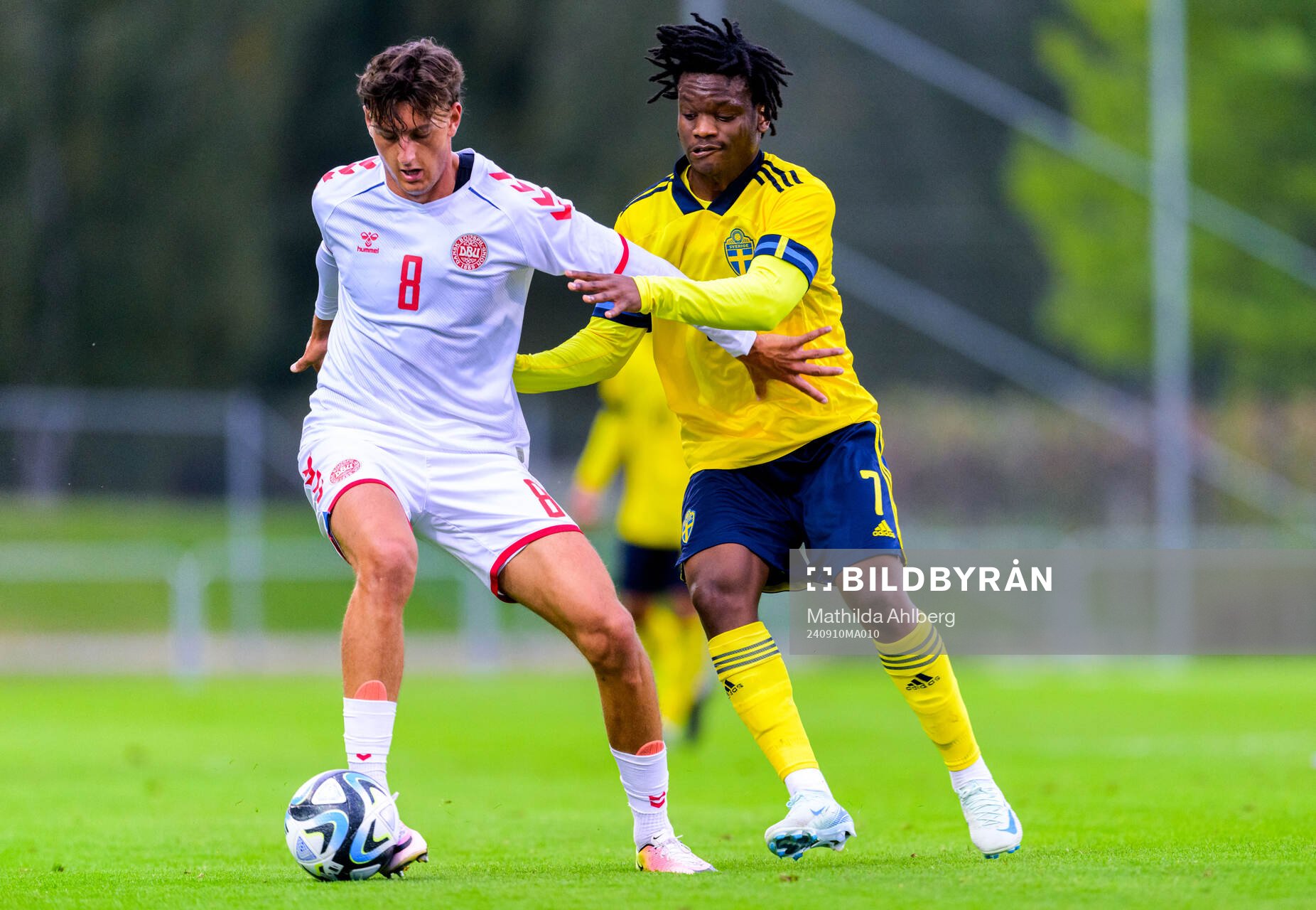 Silas Andersen of Denmark and Jeremy Agbonifo of Sweden during the U20 football match between Sweden and Denmark on September 10, 2024 in Hässleholm.