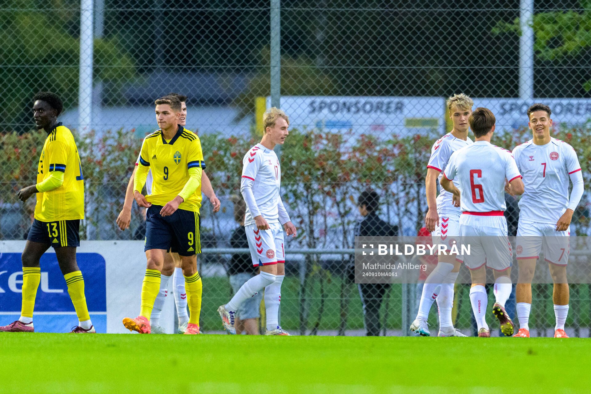 Peter Amoran and Leonardo De Oliveira of Sweden looks dejected and Clement Bischoff of Denmark celebrates 0-2 during the U20 football match between Sweden and Denmark on September 10, 2024 in Hässleholm.