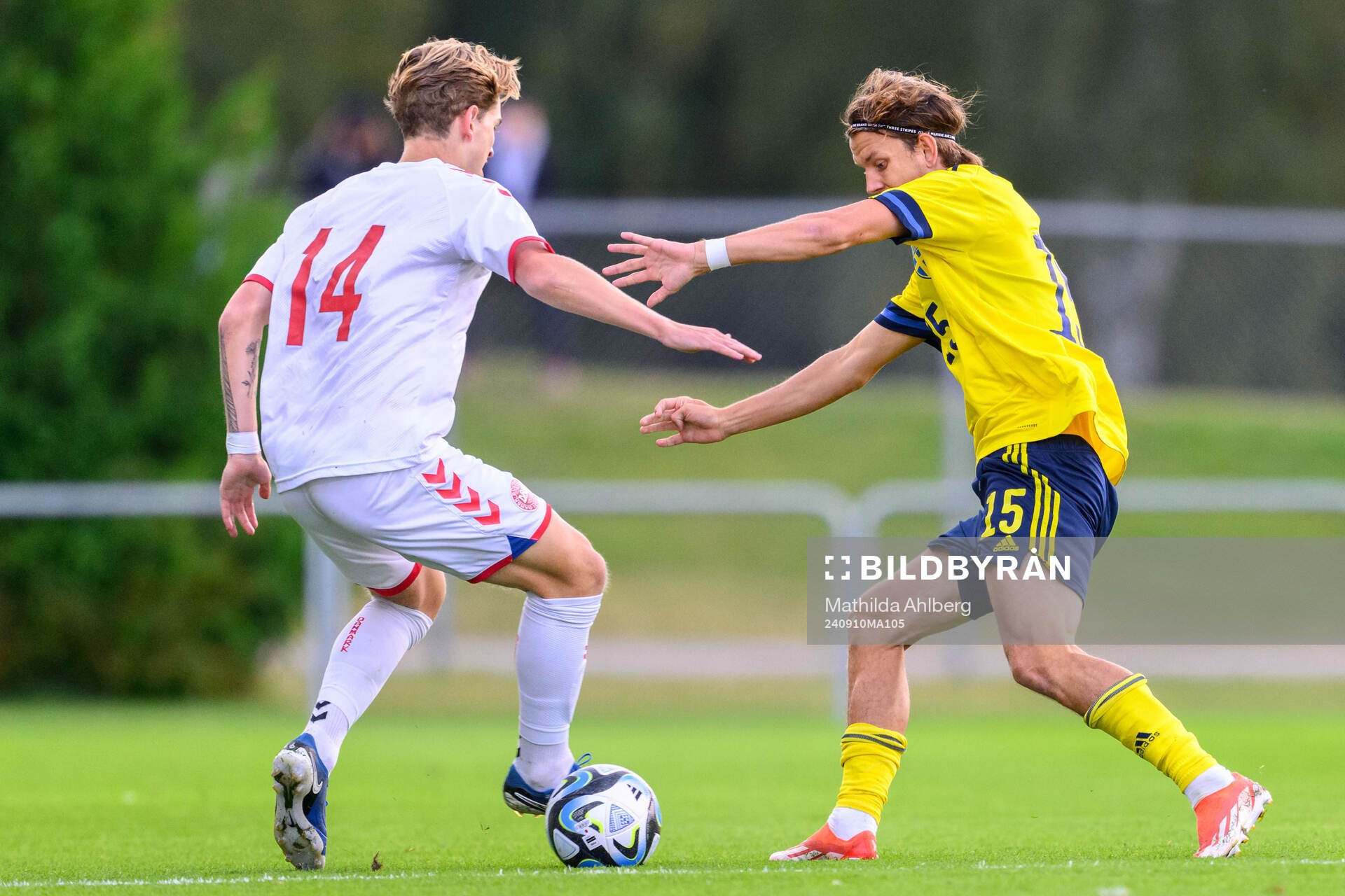 Valdemar Byskov of Denmark and Kazper Karlsson of Sweden during the U20 football match between Sweden and Denmark on September 10, 2024 in Hässleholm.