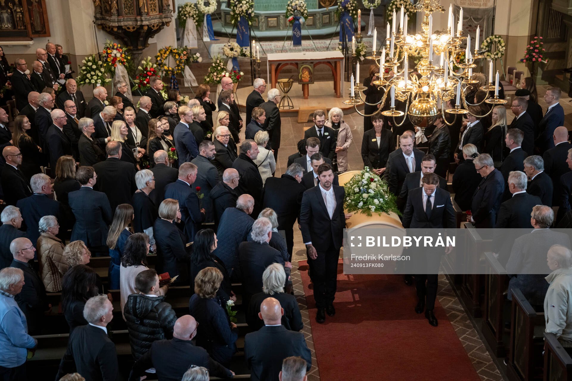 The coffin is carried out