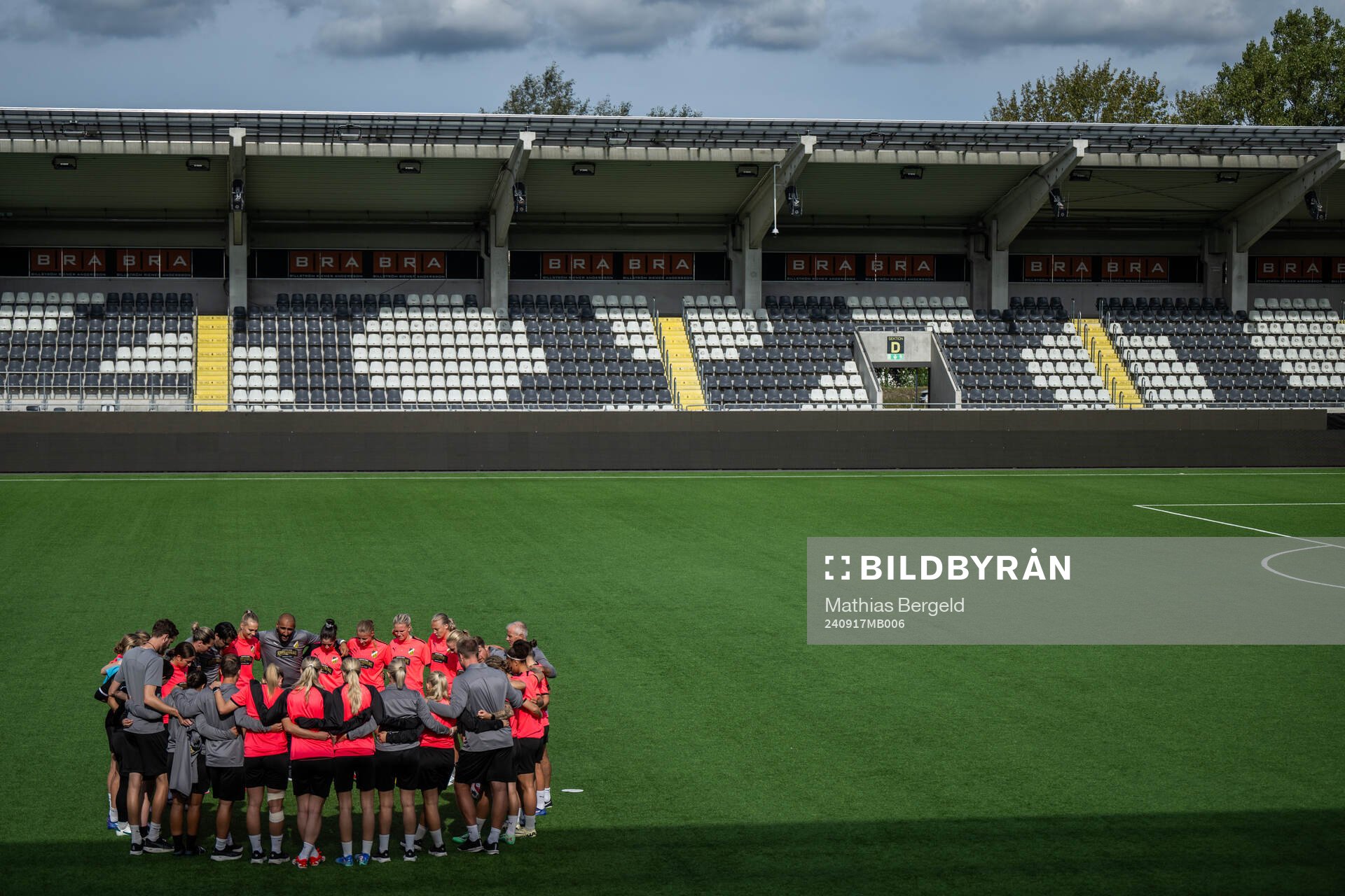 Players and staff gather