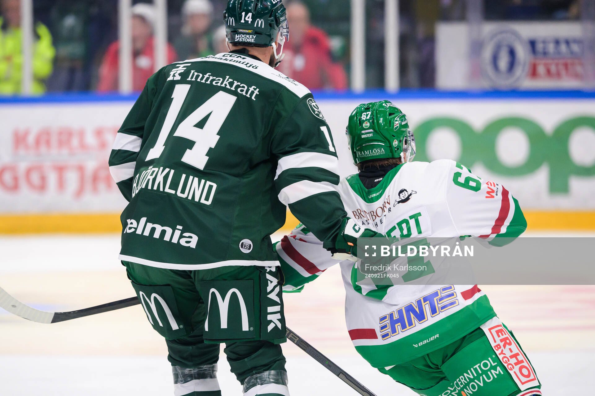 Färjestads Henrik Björklund och Rögles Leon Bristedt