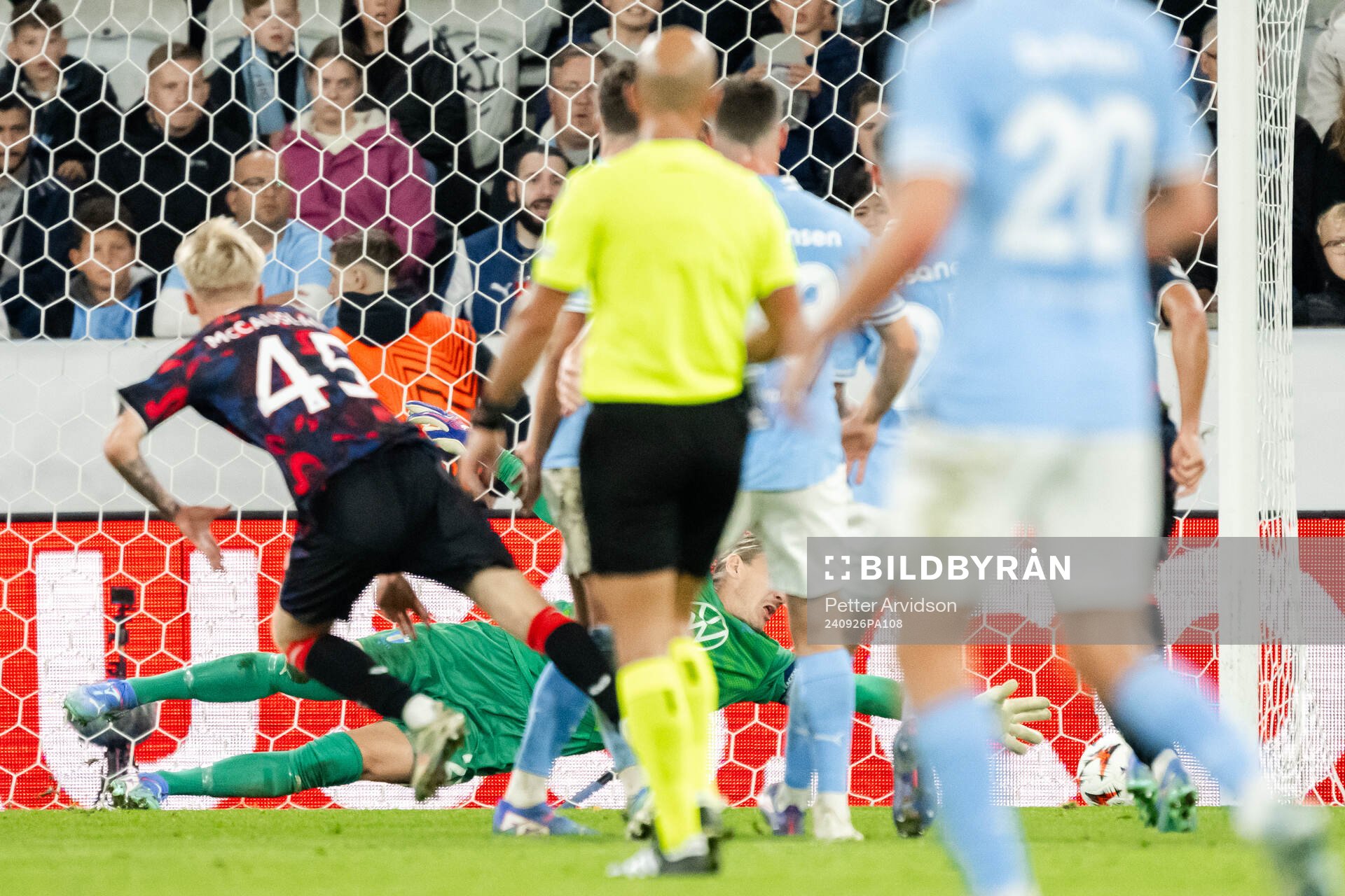 Ross McCausland of Rangers scores the 0-2 goal behind goalkeeper Johan Dahlin of Malmö FF during the UEFA Europa League football match between Malmö FF and Rangers on September 26, 2024 in Malmö.