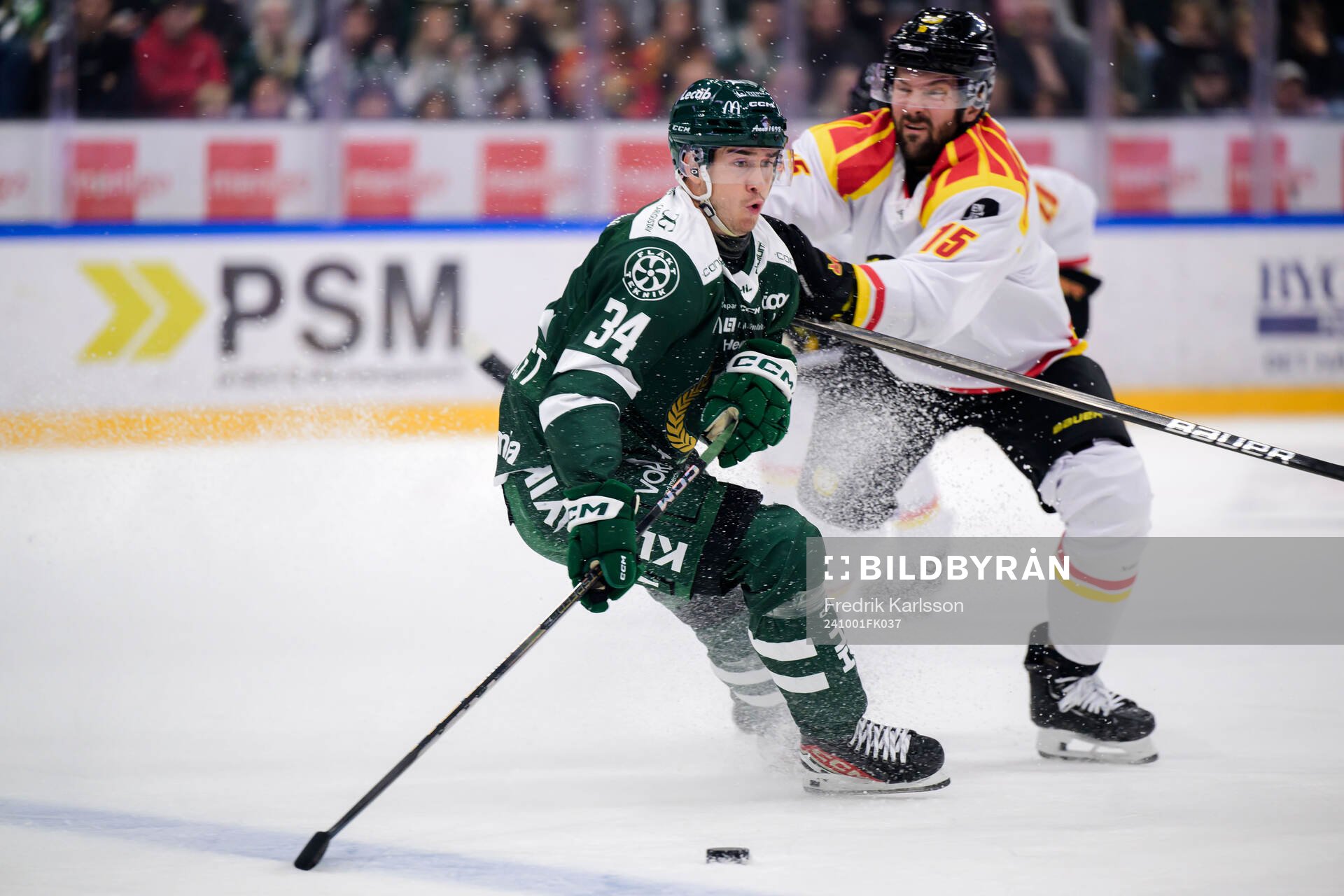 Färjestads Michael Lindqvist och Brynäs Simon Bertilsson