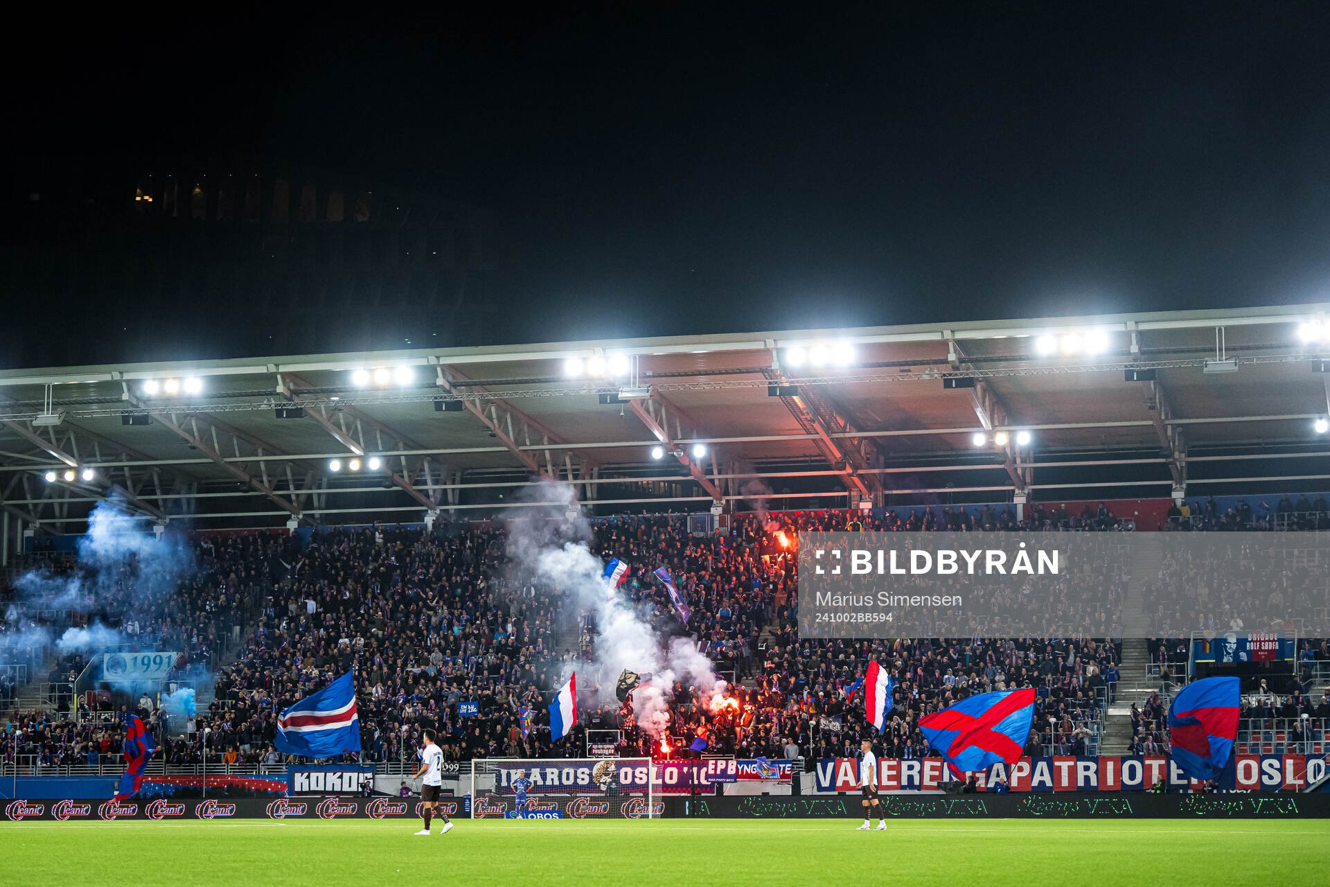 Spectators in the stands celebrates