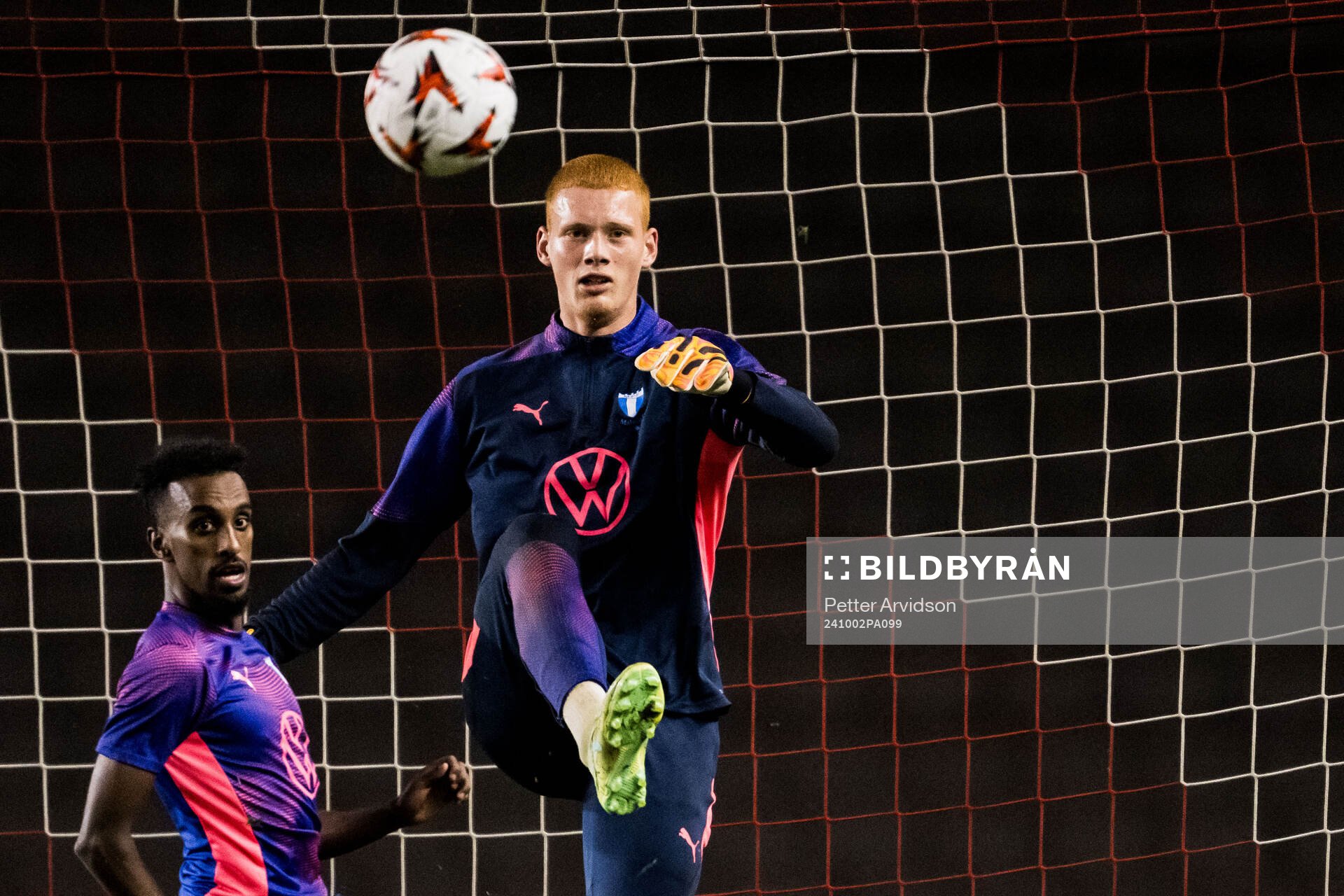 Taha Ali and Goalkeeper Joakim Persson of Malmö FF