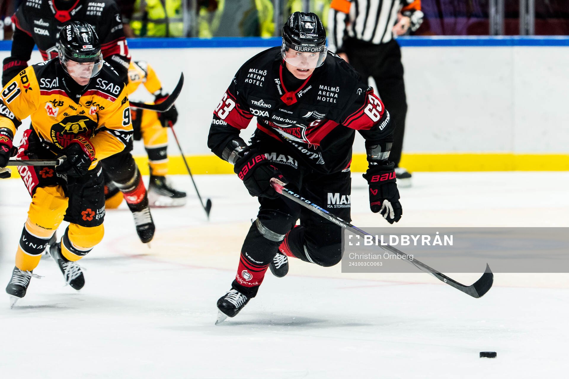 Malmö Redhawks Fredrik Händemark och Luleås Brian O'neil
