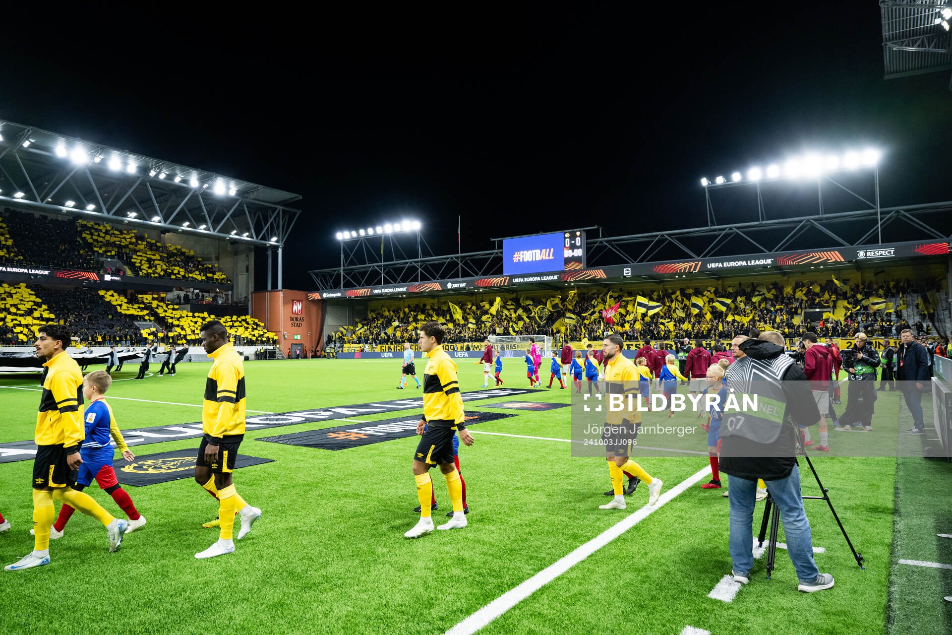 The teams enters the pitch