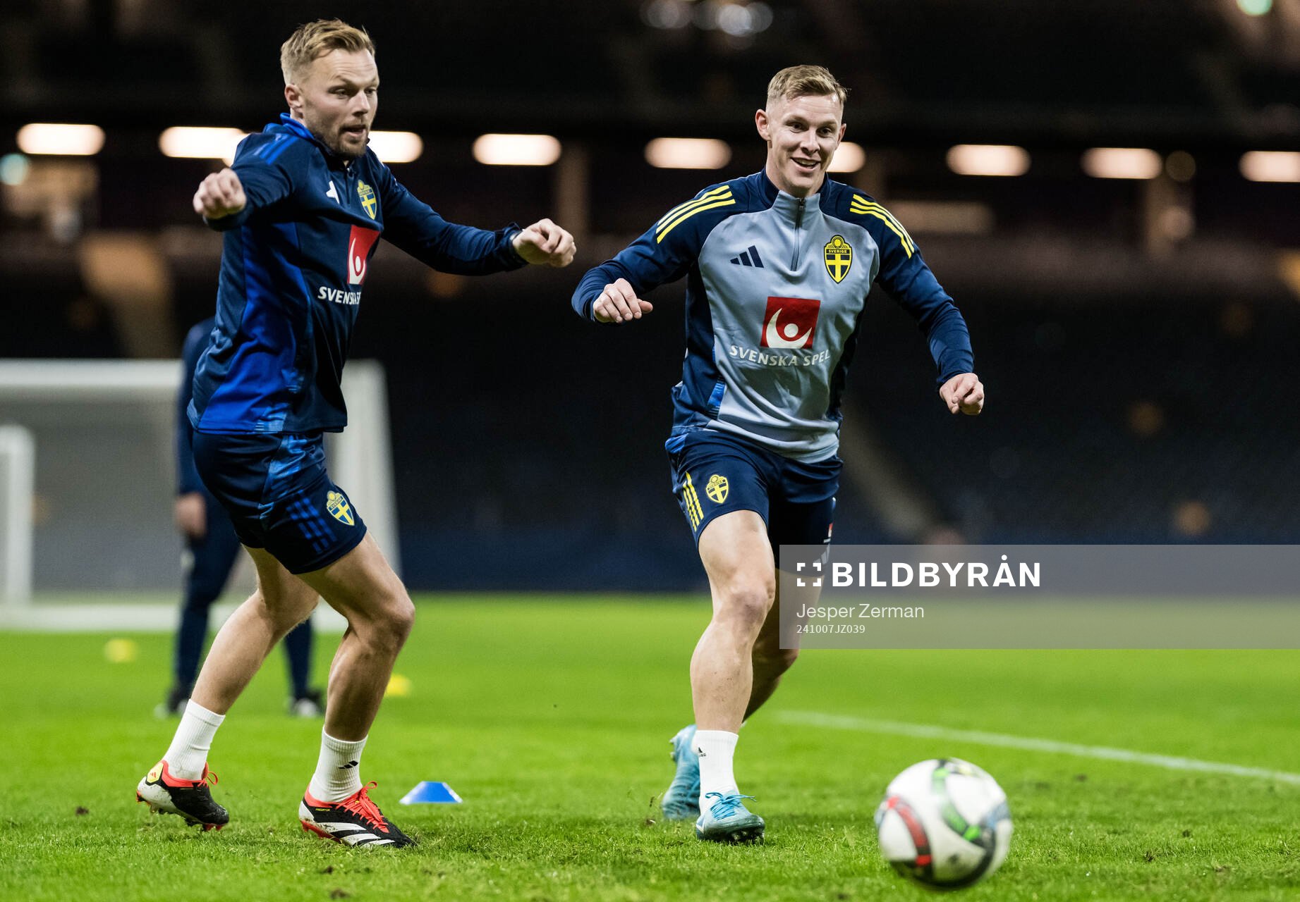assistant coach Sebastian Larsson and Emil Krafth of the