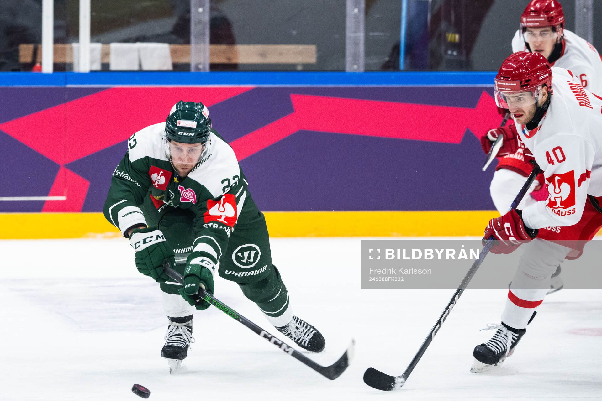 Per Åslund of Färjestad and Milos Roman of Ocelari Trinec