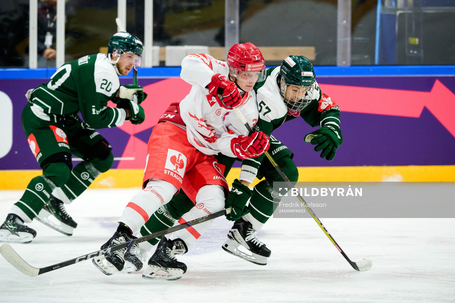 Petr Sikora of Ocelari Trinec and Malte Vass of Färjestad